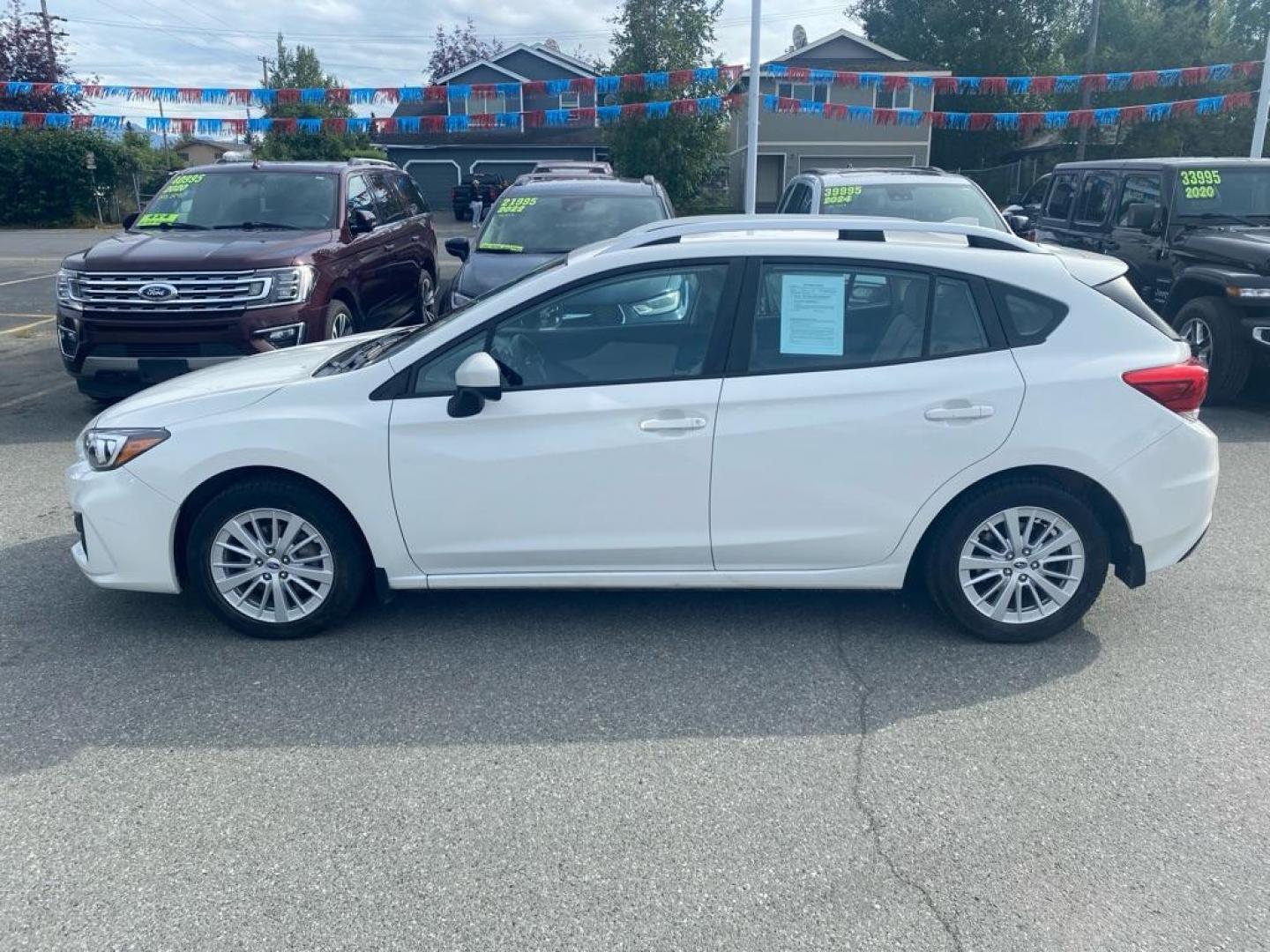 2017 WHITE SUBARU IMPREZA PREMIUM (4S3GTAB65H3) with an 2.0L engine, Continuously Variable transmission, located at 929 East 8th Ave, Anchorage, AK, 99501, (907) 274-2277, 61.214783, -149.866074 - Photo#1