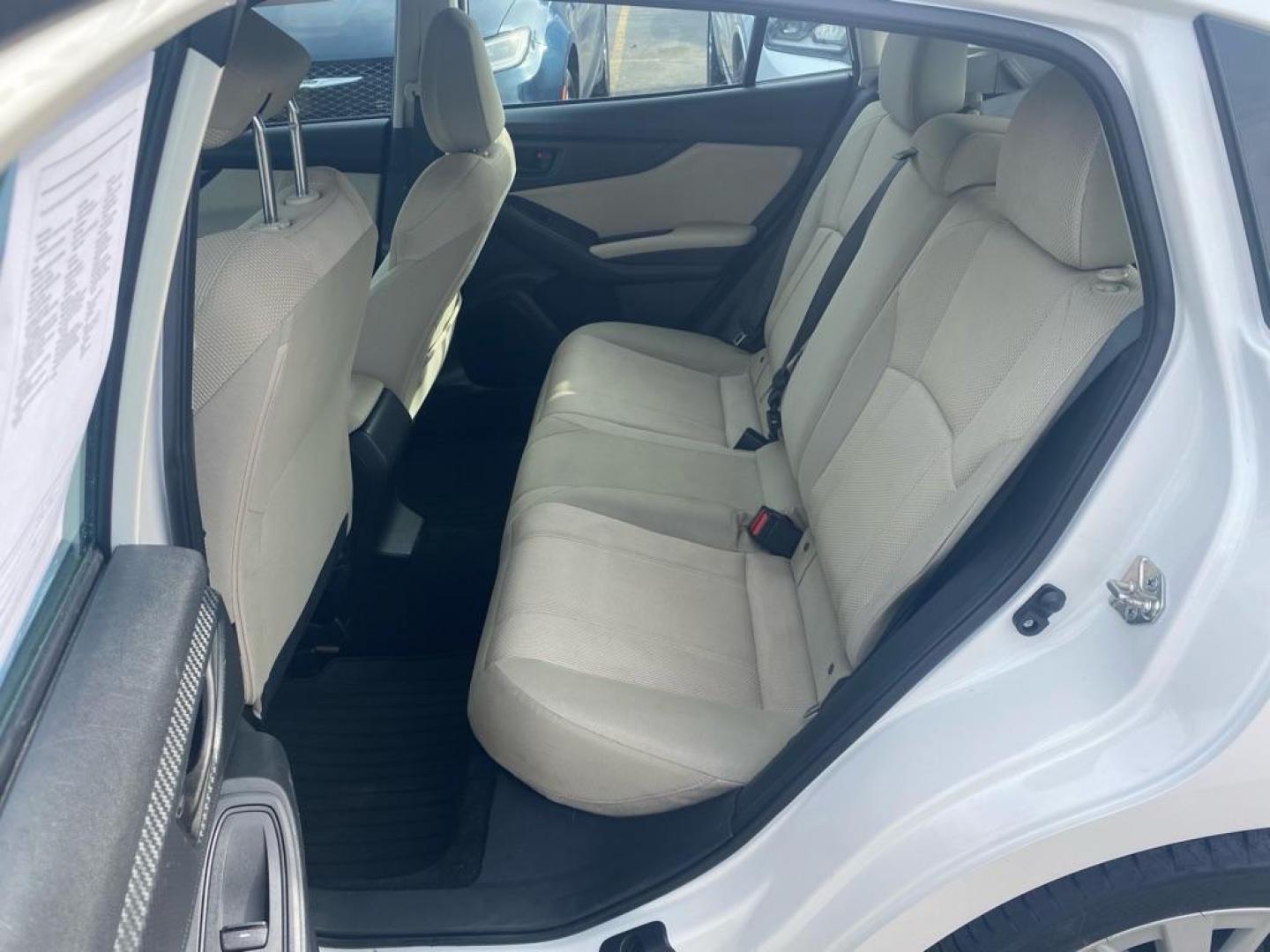 2017 WHITE SUBARU IMPREZA PREMIUM (4S3GTAB65H3) with an 2.0L engine, Continuously Variable transmission, located at 929 East 8th Ave, Anchorage, AK, 99501, (907) 274-2277, 61.214783, -149.866074 - Photo#3