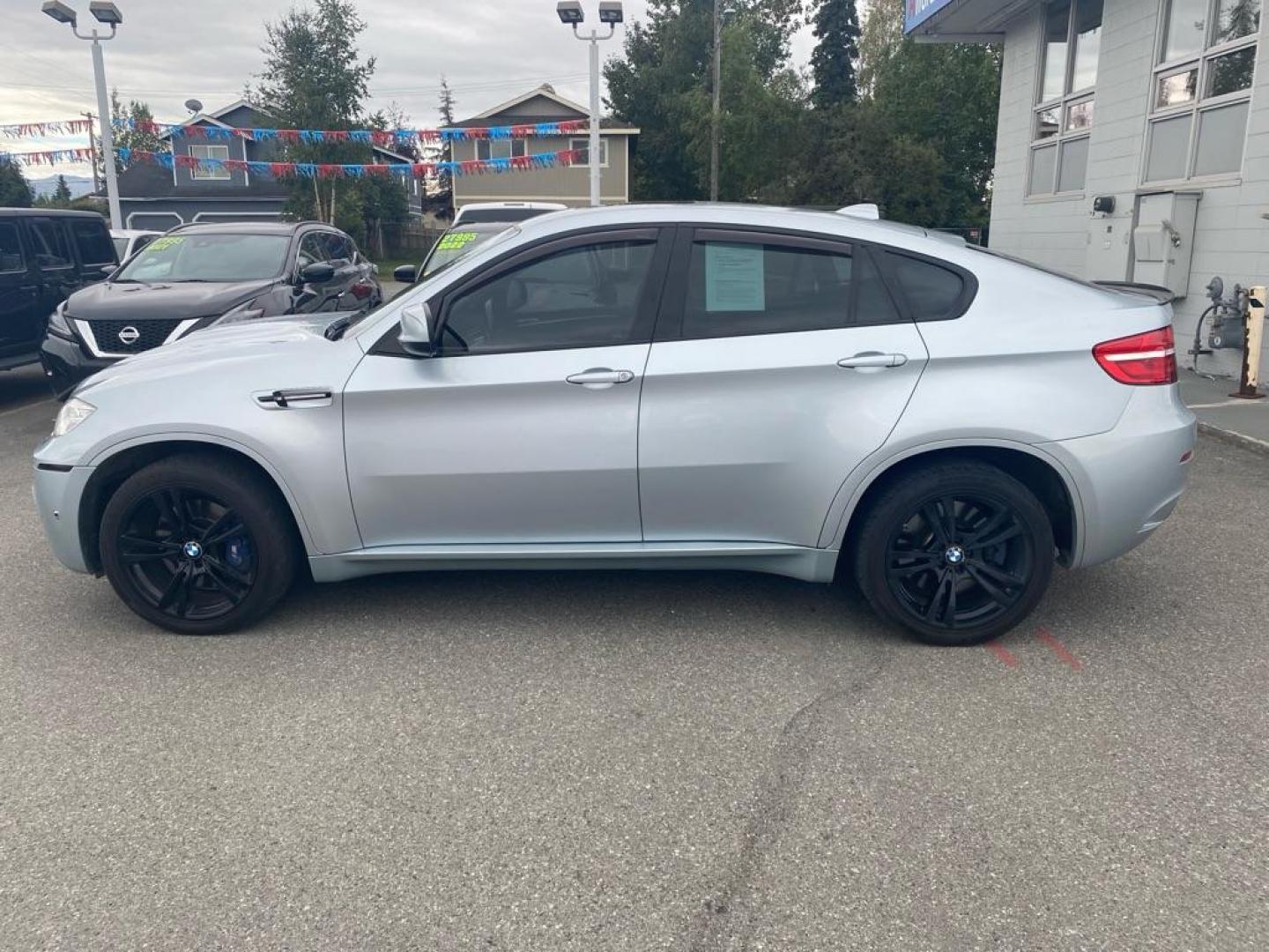 2014 SILVER BMW X6 M (5YMGZ0C53E0) with an 4.4L engine, Automatic transmission, located at 929 East 8th Ave, Anchorage, AK, 99501, (907) 274-2277, 61.214783, -149.866074 - Photo#1