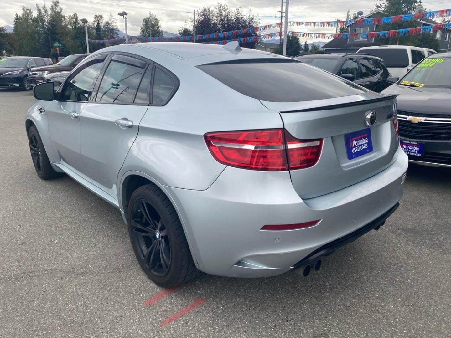 2014 SILVER BMW X6 M (5YMGZ0C53E0) with an 4.4L engine, Automatic transmission, located at 929 East 8th Ave, Anchorage, AK, 99501, (907) 274-2277, 61.214783, -149.866074 - Photo#2