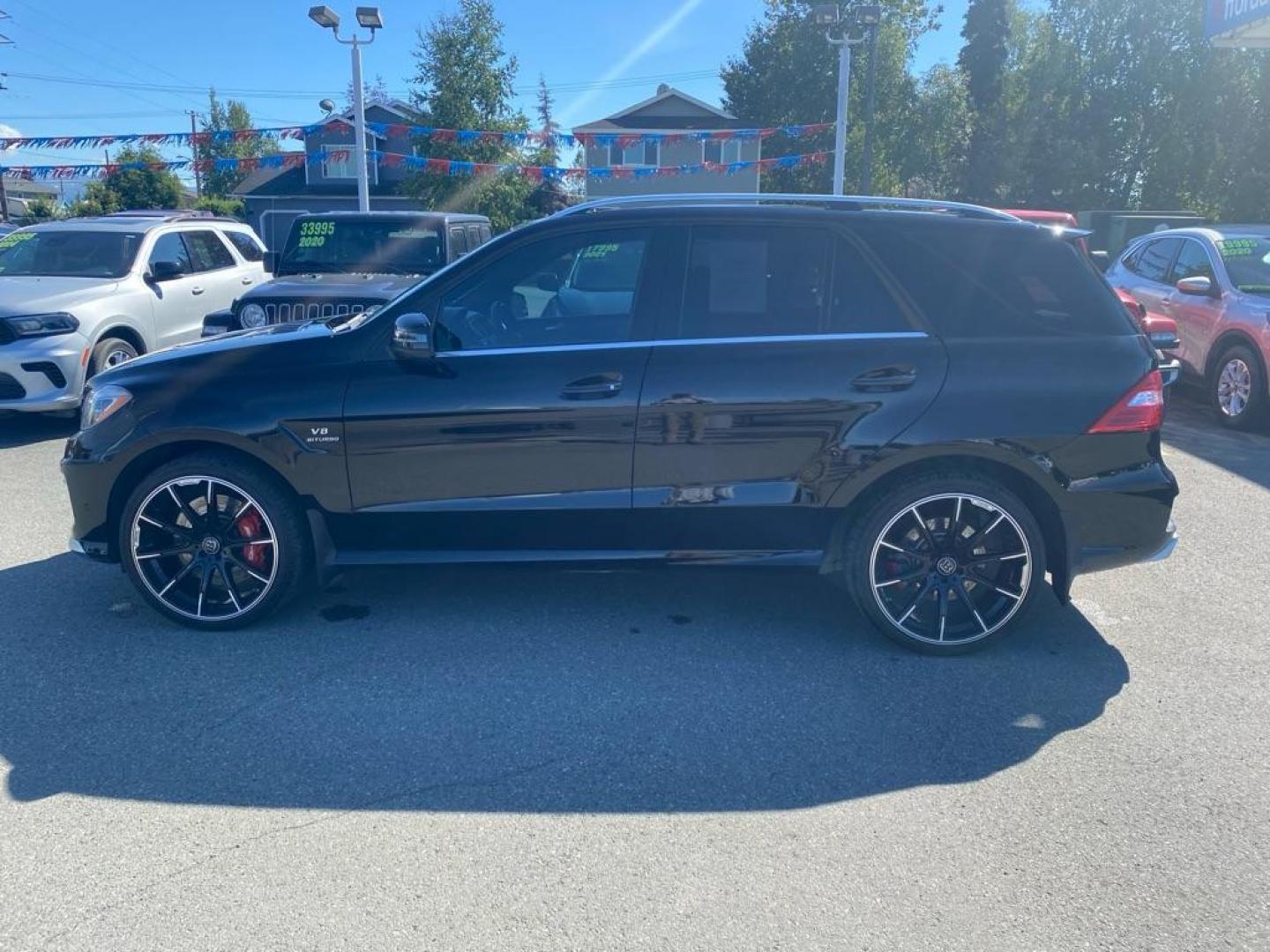 2012 BLACK MERCEDES-BENZ ML 63 AMG (4JGDA7EB9CA) with an 5.5L engine, Automatic transmission, located at 929 East 8th Ave, Anchorage, AK, 99501, (907) 274-2277, 61.214783, -149.866074 - Photo#1