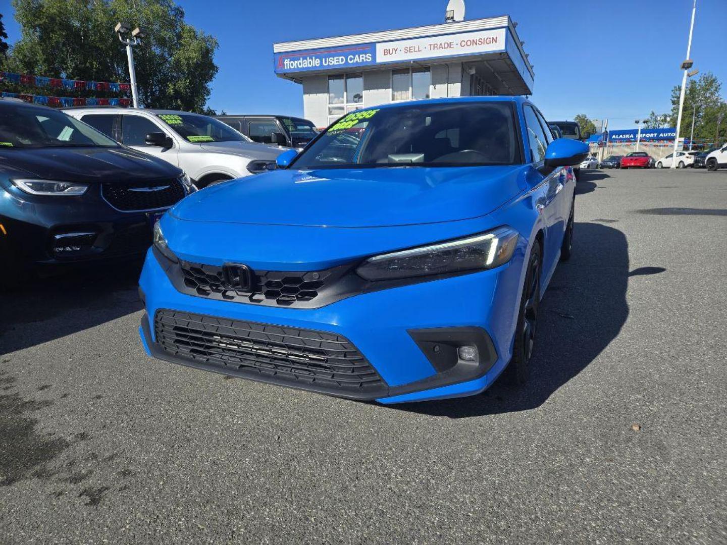 2022 BLUE HONDA CIVIC SPORT TOURING (19XFL1H86NE) with an 1.5L engine, Continuously Variable transmission, located at 929 East 8th Ave, Anchorage, AK, 99501, (907) 274-2277, 61.214783, -149.866074 - Photo#0