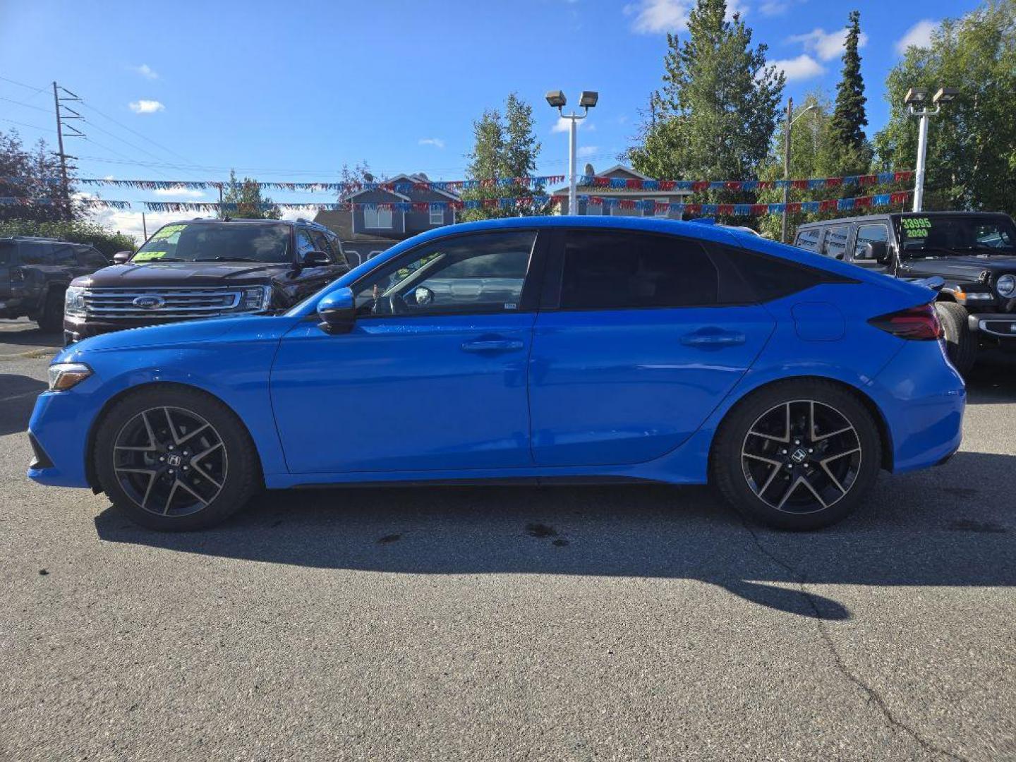 2022 BLUE HONDA CIVIC SPORT TOURING (19XFL1H86NE) with an 1.5L engine, Continuously Variable transmission, located at 929 East 8th Ave, Anchorage, AK, 99501, (907) 274-2277, 61.214783, -149.866074 - Photo#1