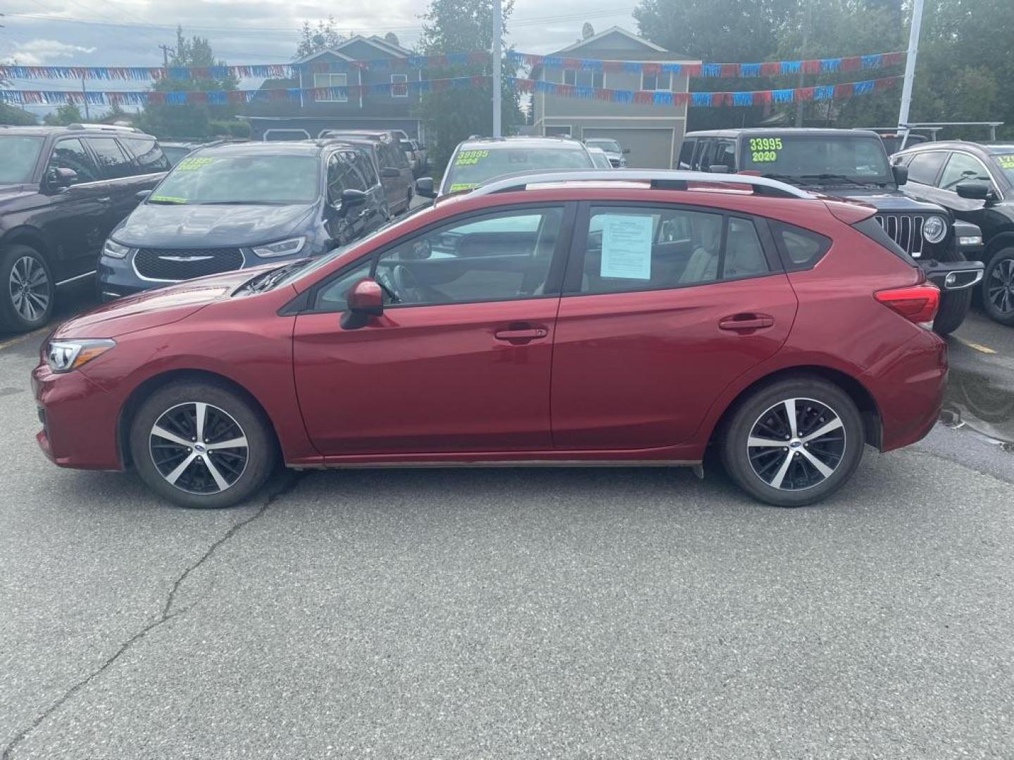 2019 RED SUBARU IMPREZA PREMIUM (4S3GTAD66K3) with an 2.0L engine, Continuously Variable transmission, located at 929 East 8th Ave, Anchorage, AK, 99501, (907) 274-2277, 61.214783, -149.866074 - Photo#1