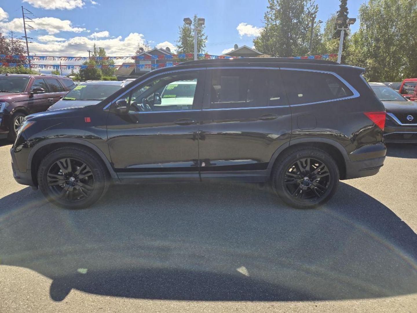 2021 BLACK HONDA PILOT SE (5FNYF6H23MB) with an 3.5L engine, Automatic transmission, located at 929 East 8th Ave, Anchorage, AK, 99501, (907) 274-2277, 61.214783, -149.866074 - Photo#1