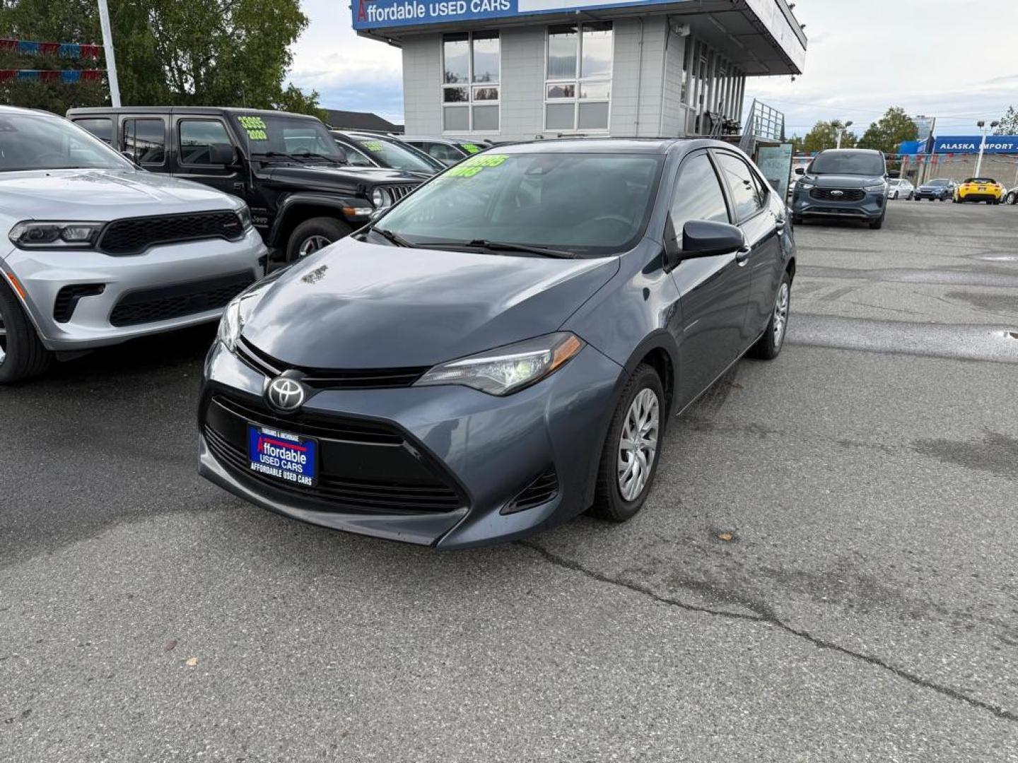 2018 BLUE TOYOTA COROLLA LE LE (2T1BURHE1JC) with an 1.8L engine, Continuously Variable transmission, located at 929 East 8th Ave, Anchorage, AK, 99501, (907) 274-2277, 61.214783, -149.866074 - Photo#0