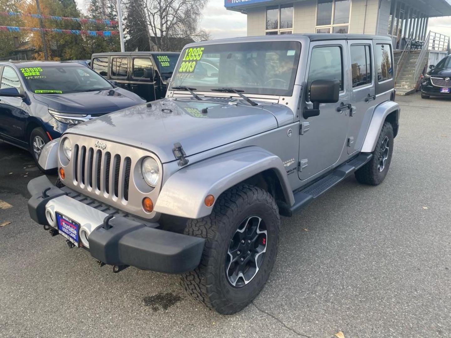 2013 SILVER JEEP WRANGLER UNLIMI SAHARA (1C4HJWEG5DL) with an 3.6L engine, Automatic transmission, located at 929 East 8th Ave, Anchorage, AK, 99501, (907) 274-2277, 61.214783, -149.866074 - Photo#0