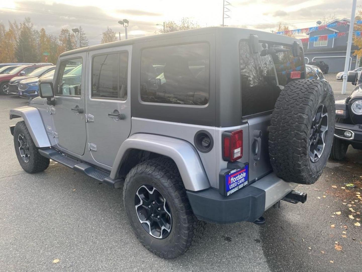 2013 SILVER JEEP WRANGLER UNLIMI SAHARA (1C4HJWEG5DL) with an 3.6L engine, Automatic transmission, located at 929 East 8th Ave, Anchorage, AK, 99501, (907) 274-2277, 61.214783, -149.866074 - Photo#2