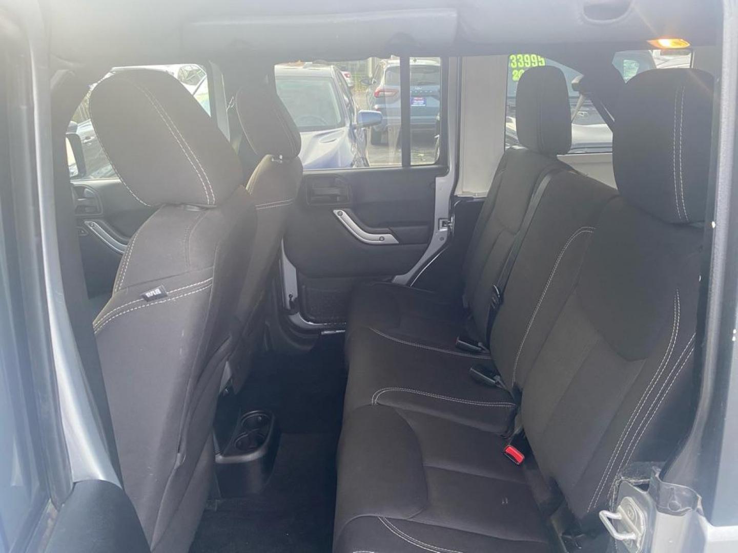 2013 SILVER JEEP WRANGLER UNLIMI SAHARA (1C4HJWEG5DL) with an 3.6L engine, Automatic transmission, located at 929 East 8th Ave, Anchorage, AK, 99501, (907) 274-2277, 61.214783, -149.866074 - Photo#3