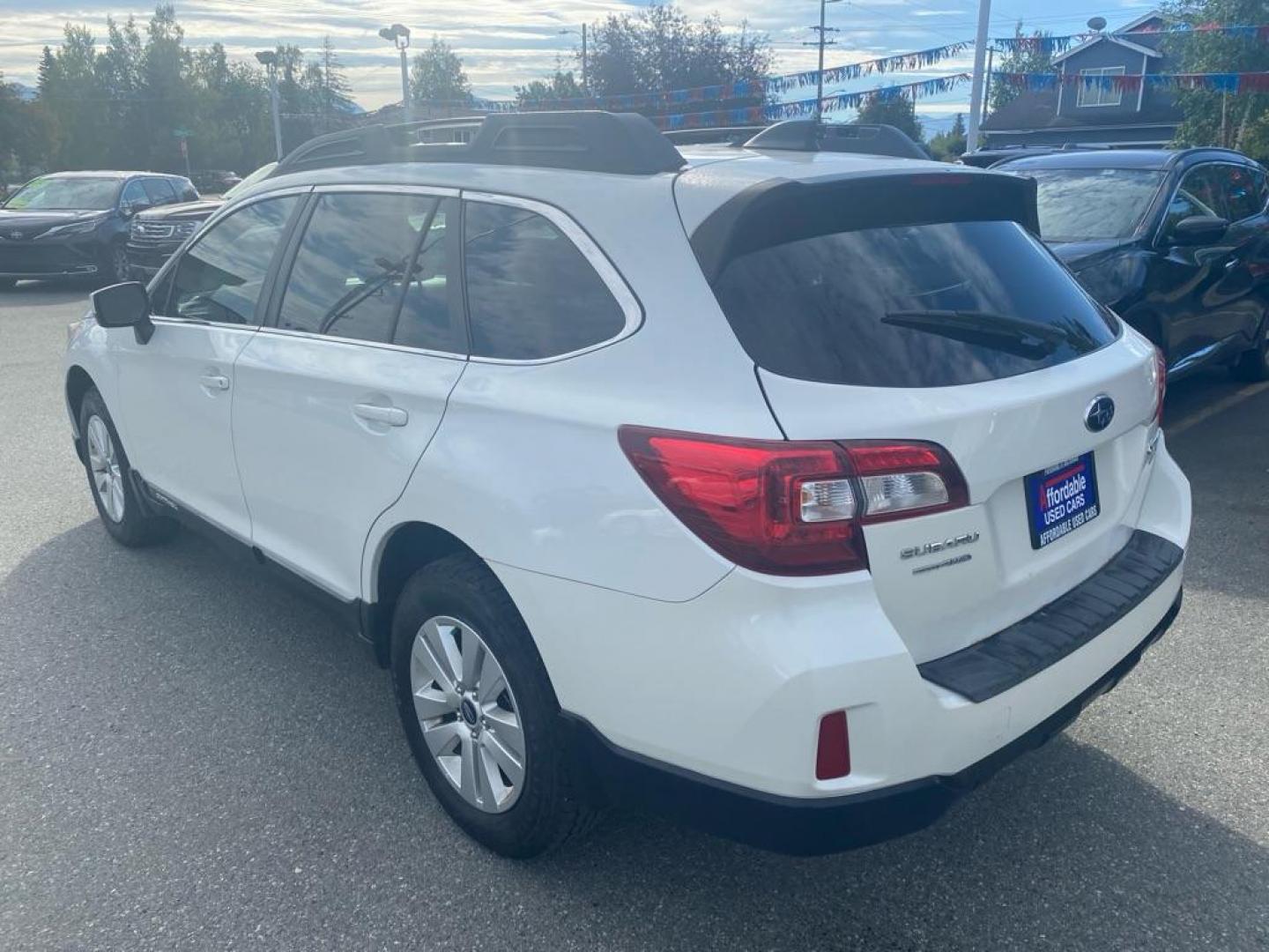 2017 WHITE SUBARU OUTBACK 2.5I PREMIUM (4S4BSACC6H3) with an 2.5L engine, Continuously Variable transmission, located at 929 East 8th Ave, Anchorage, AK, 99501, (907) 274-2277, 61.214783, -149.866074 - Photo#2