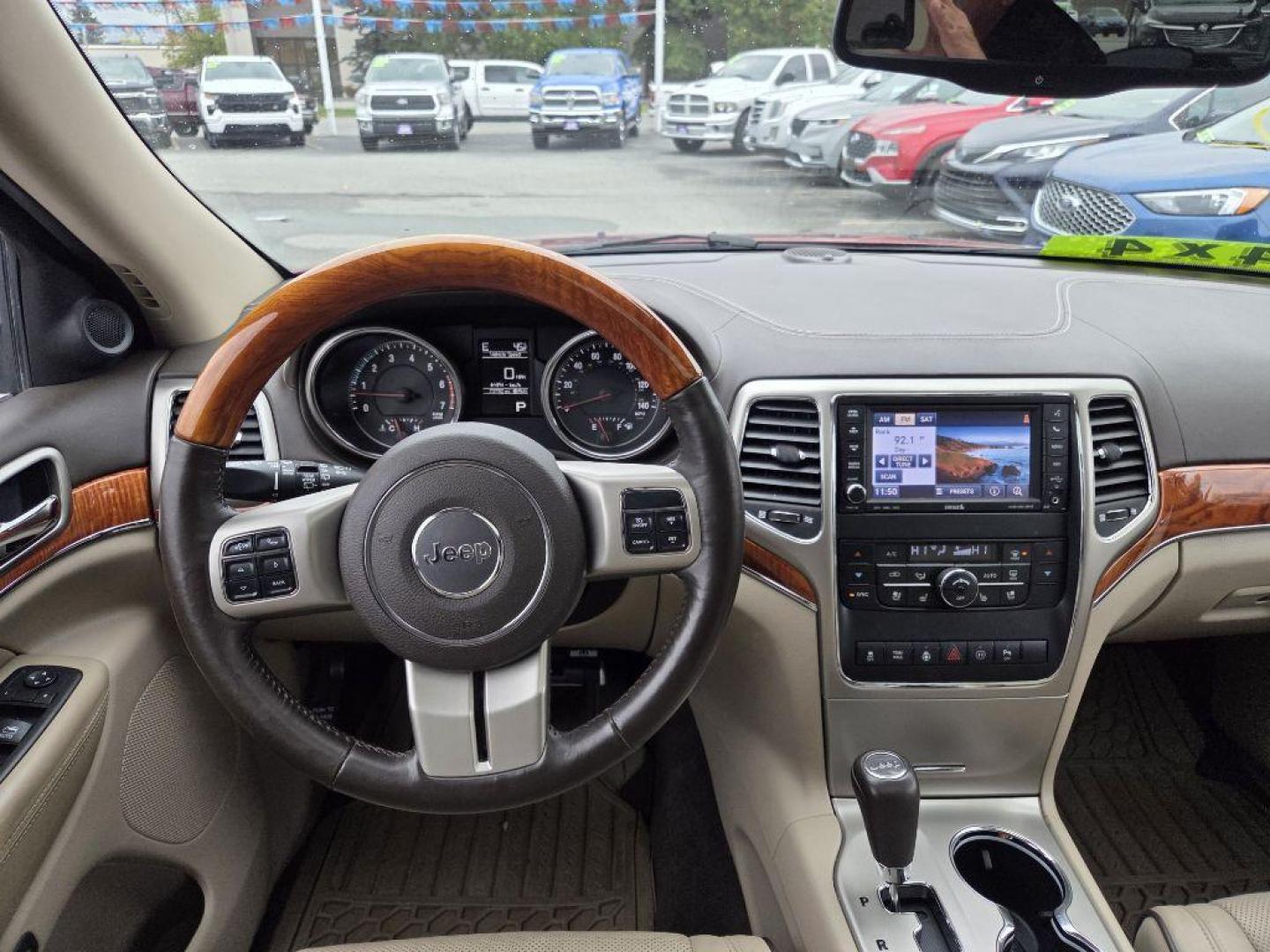2012 RED JEEP GRAND CHEROKEE OVERLAND (1C4RJFCT3CC) with an 5.7L engine, Automatic transmission, located at 929 East 8th Ave, Anchorage, AK, 99501, (907) 274-2277, 61.214783, -149.866074 - Photo#2