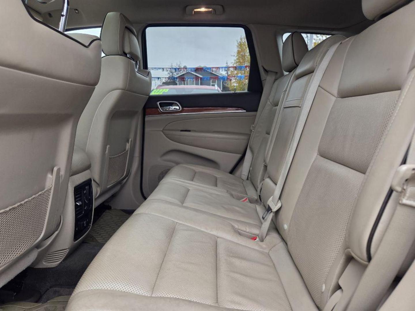 2012 RED JEEP GRAND CHEROKEE OVERLAND (1C4RJFCT3CC) with an 5.7L engine, Automatic transmission, located at 929 East 8th Ave, Anchorage, AK, 99501, (907) 274-2277, 61.214783, -149.866074 - Photo#3