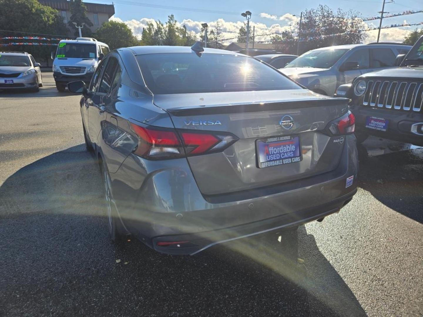 2022 GRAY NISSAN VERSA SV (3N1CN8EV0NL) with an 1.6L engine, Automatic transmission, located at 929 East 8th Ave, Anchorage, AK, 99501, (907) 274-2277, 61.214783, -149.866074 - Photo#2