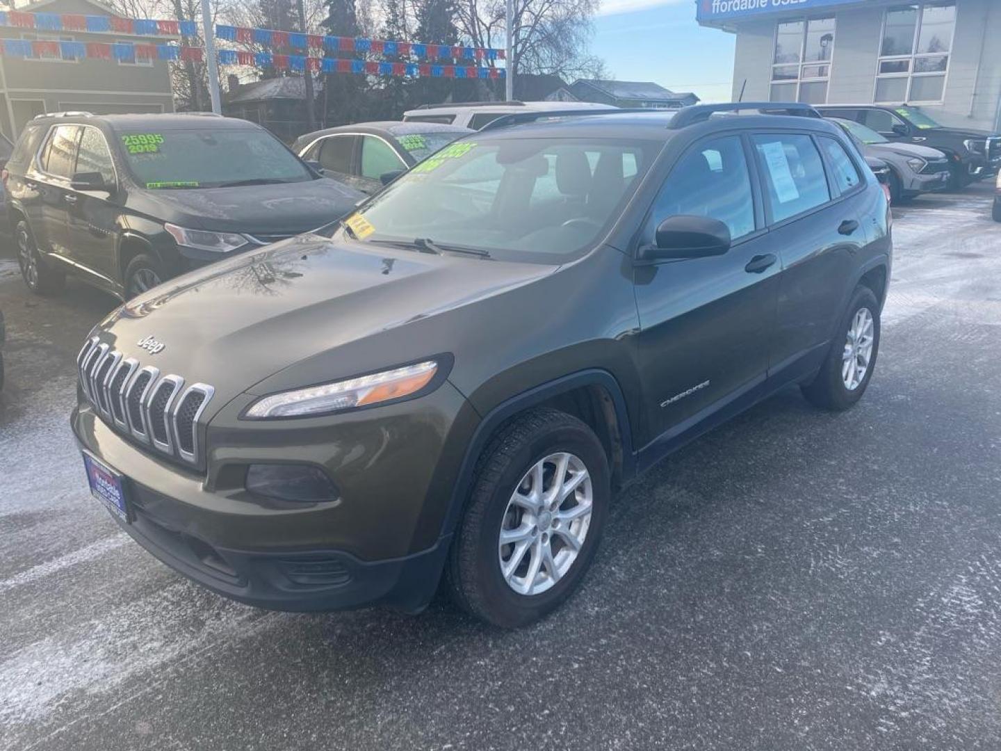 2016 GREEN JEEP CHEROKEE SPORT (1C4PJMAB3GW) with an 2.4L engine, Automatic transmission, located at 929 East 8th Ave, Anchorage, AK, 99501, (907) 274-2277, 61.214783, -149.866074 - Photo#0