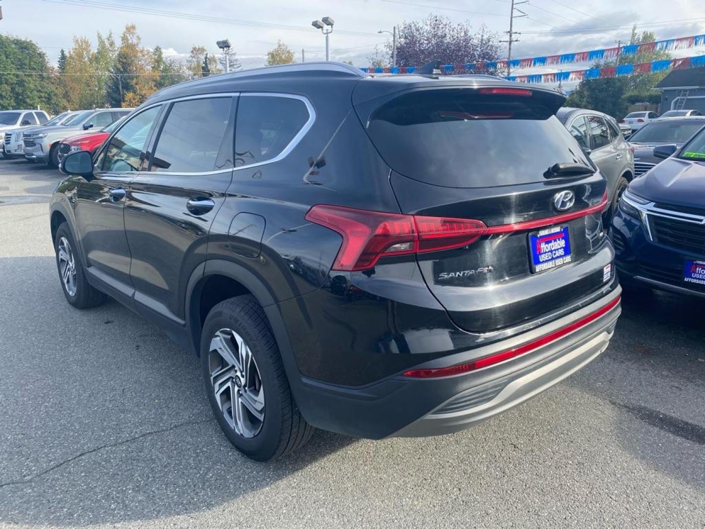 2023 BLACK HYUNDAI SANTA FE SEL SEL (5NMS2DAJ5PH) with an 2.5L engine, Automatic transmission, located at 929 East 8th Ave, Anchorage, AK, 99501, (907) 274-2277, 61.214783, -149.866074 - Photo#2