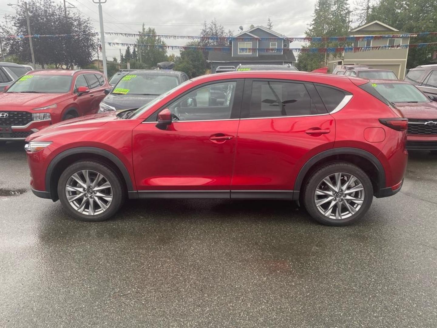 2021 RED MAZDA CX-5 GRAND TOURING (JM3KFBDM7M0) with an 2.5L engine, Automatic transmission, located at 929 East 8th Ave, Anchorage, AK, 99501, (907) 274-2277, 61.214783, -149.866074 - Photo#1