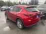 2021 RED MAZDA CX-5 GRAND TOURING (JM3KFBDM7M0) with an 2.5L engine, Automatic transmission, located at 929 East 8th Ave, Anchorage, AK, 99501, (907) 274-2277, 61.214783, -149.866074 - Photo#2