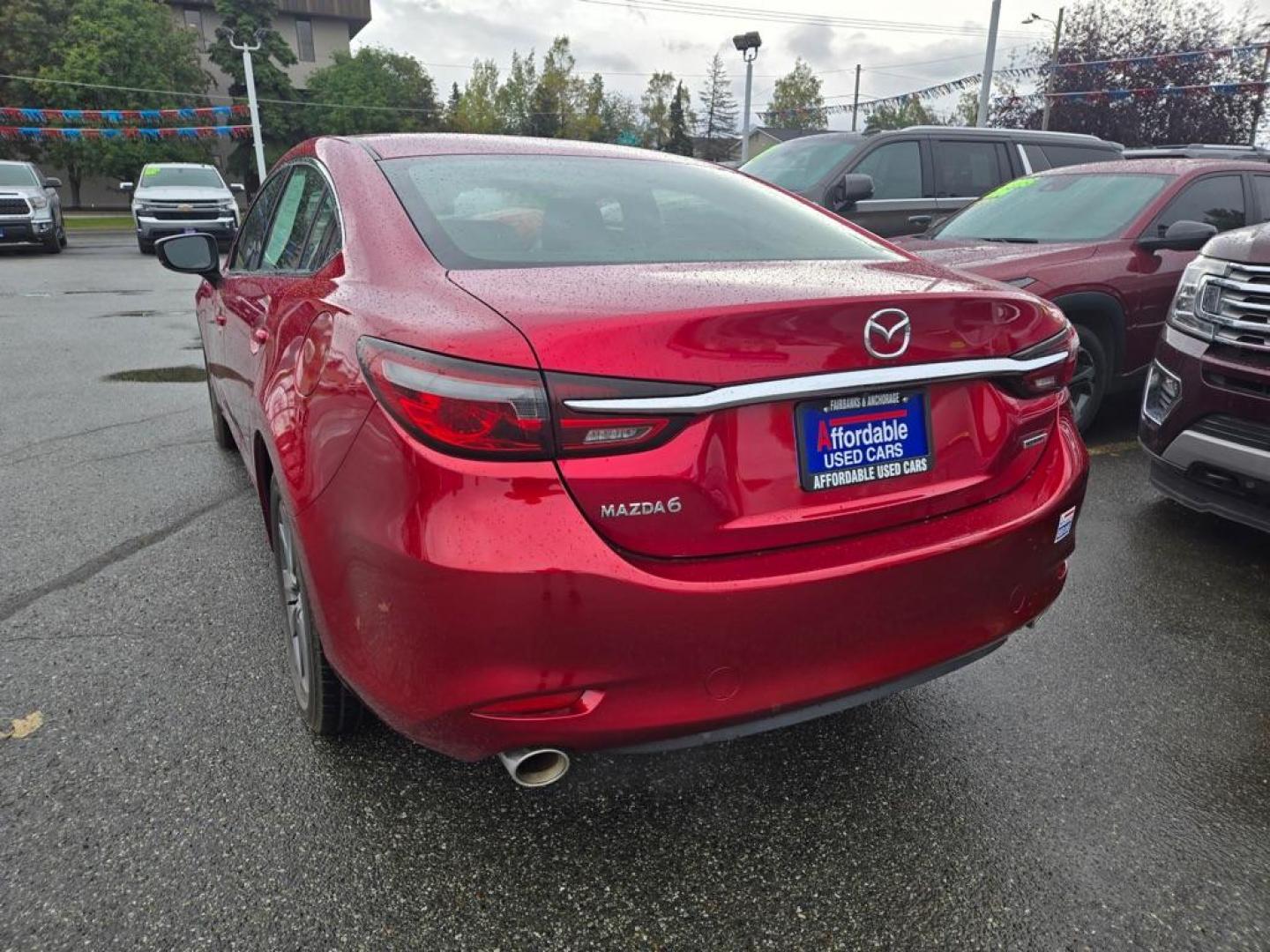 2021 RED MAZDA 6 TOURING (JM1GL1VM4M1) with an 2.5L engine, Automatic transmission, located at 929 East 8th Ave, Anchorage, AK, 99501, (907) 274-2277, 61.214783, -149.866074 - Photo#2