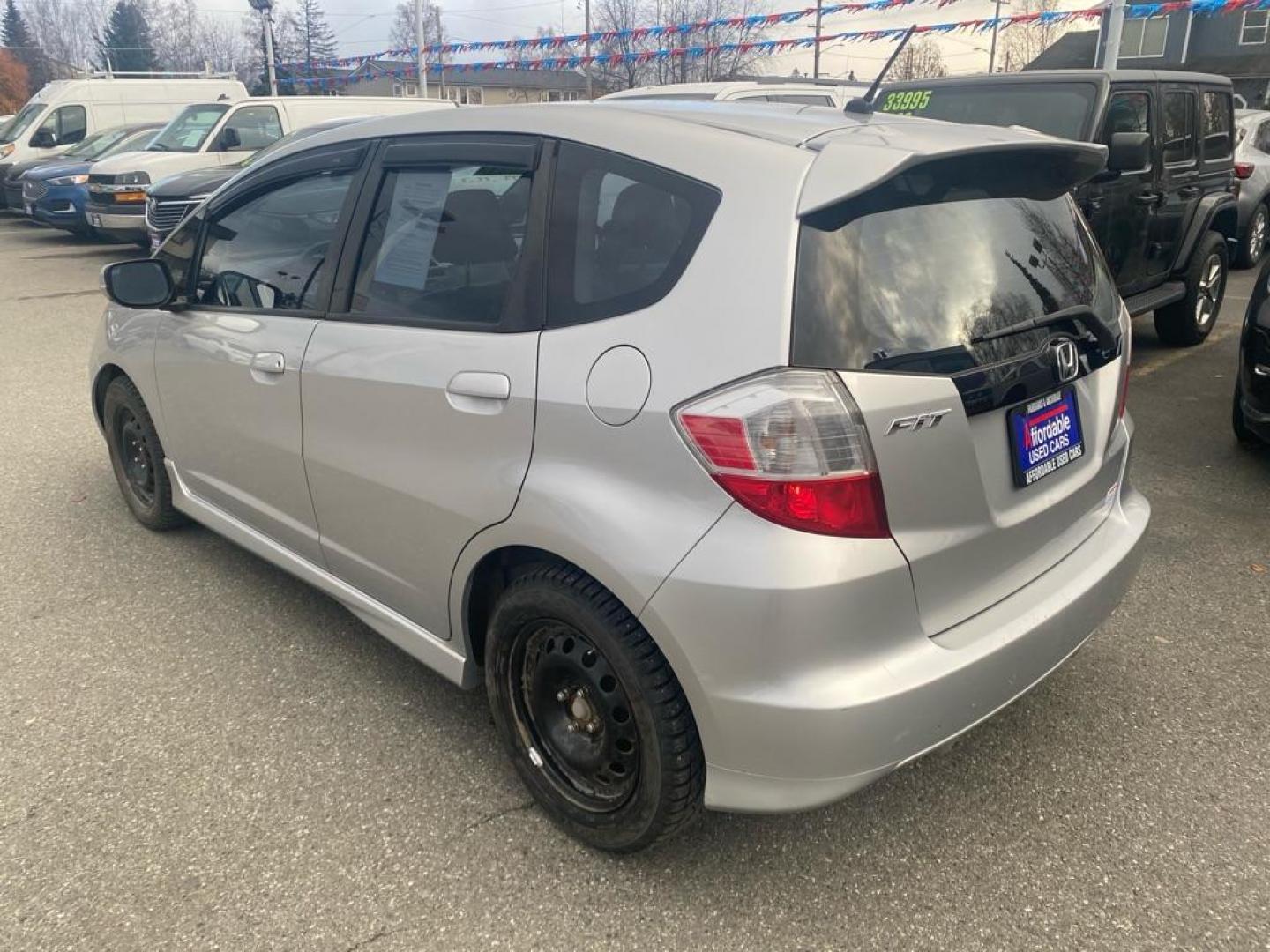 2011 SILVER HONDA FIT SPORT (JHMGE8H51BS) with an 1.5L engine, Automatic transmission, located at 929 East 8th Ave, Anchorage, AK, 99501, (907) 274-2277, 61.214783, -149.866074 - Photo#2