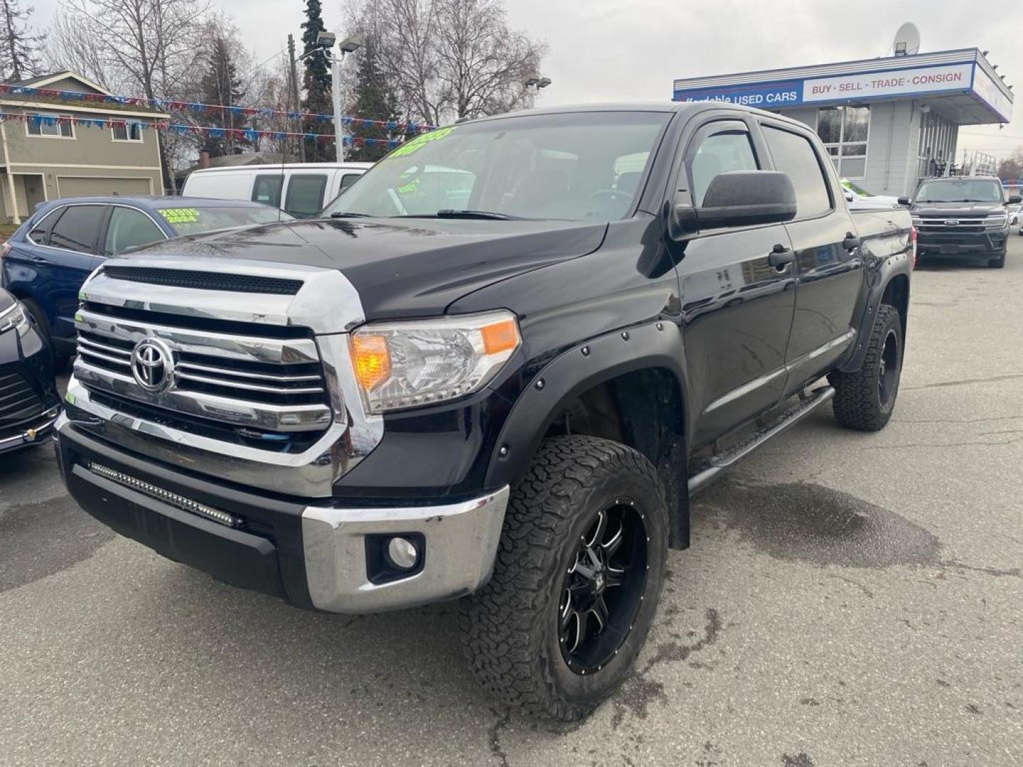 2017 BLACK TOYOTA TUNDRA CREWMAX SR5 (5TFDY5F1XHX) with an 5.7L engine, Automatic transmission, located at 929 East 8th Ave, Anchorage, AK, 99501, (907) 274-2277, 61.214783, -149.866074 - Photo#0