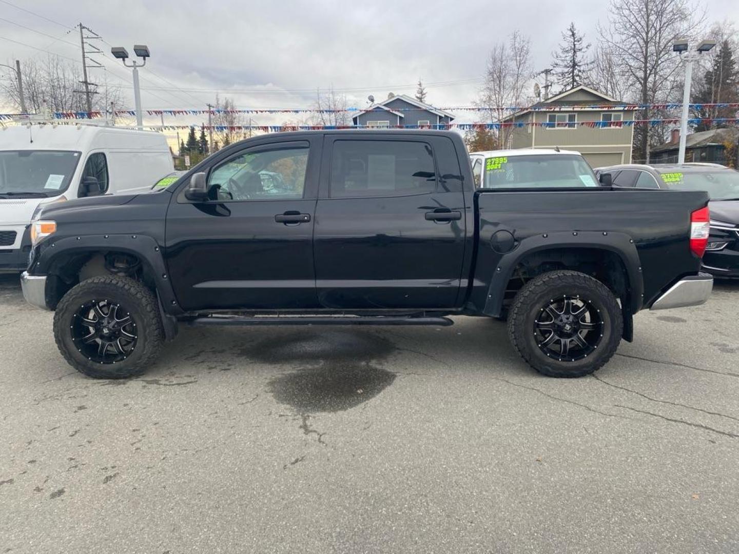 2017 BLACK TOYOTA TUNDRA CREWMAX SR5 (5TFDY5F1XHX) with an 5.7L engine, Automatic transmission, located at 929 East 8th Ave, Anchorage, AK, 99501, (907) 274-2277, 61.214783, -149.866074 - Photo#1