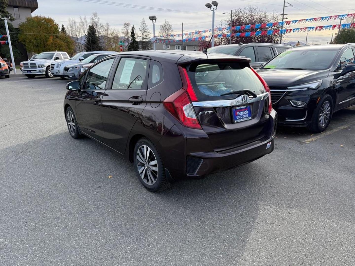 2017 MAROON HONDA FIT EX (JHMGK5H89HS) with an 1.5L engine, Continuously Variable transmission, located at 929 East 8th Ave, Anchorage, AK, 99501, (907) 274-2277, 61.214783, -149.866074 - Photo#2