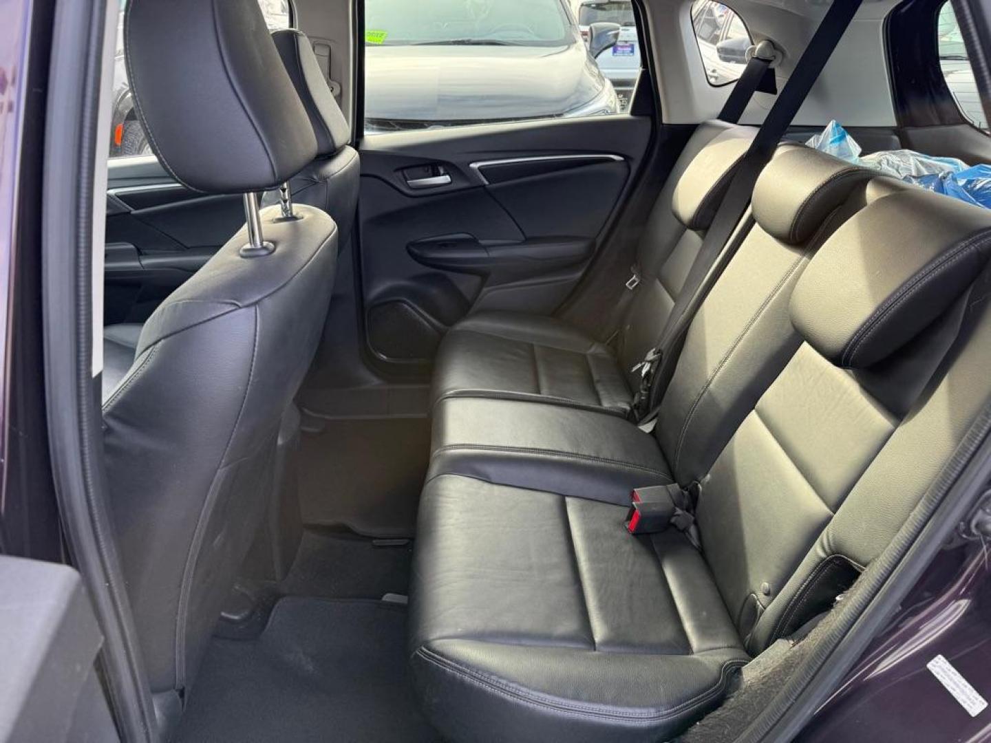 2017 MAROON HONDA FIT EX (JHMGK5H89HS) with an 1.5L engine, Continuously Variable transmission, located at 929 East 8th Ave, Anchorage, AK, 99501, (907) 274-2277, 61.214783, -149.866074 - Photo#3