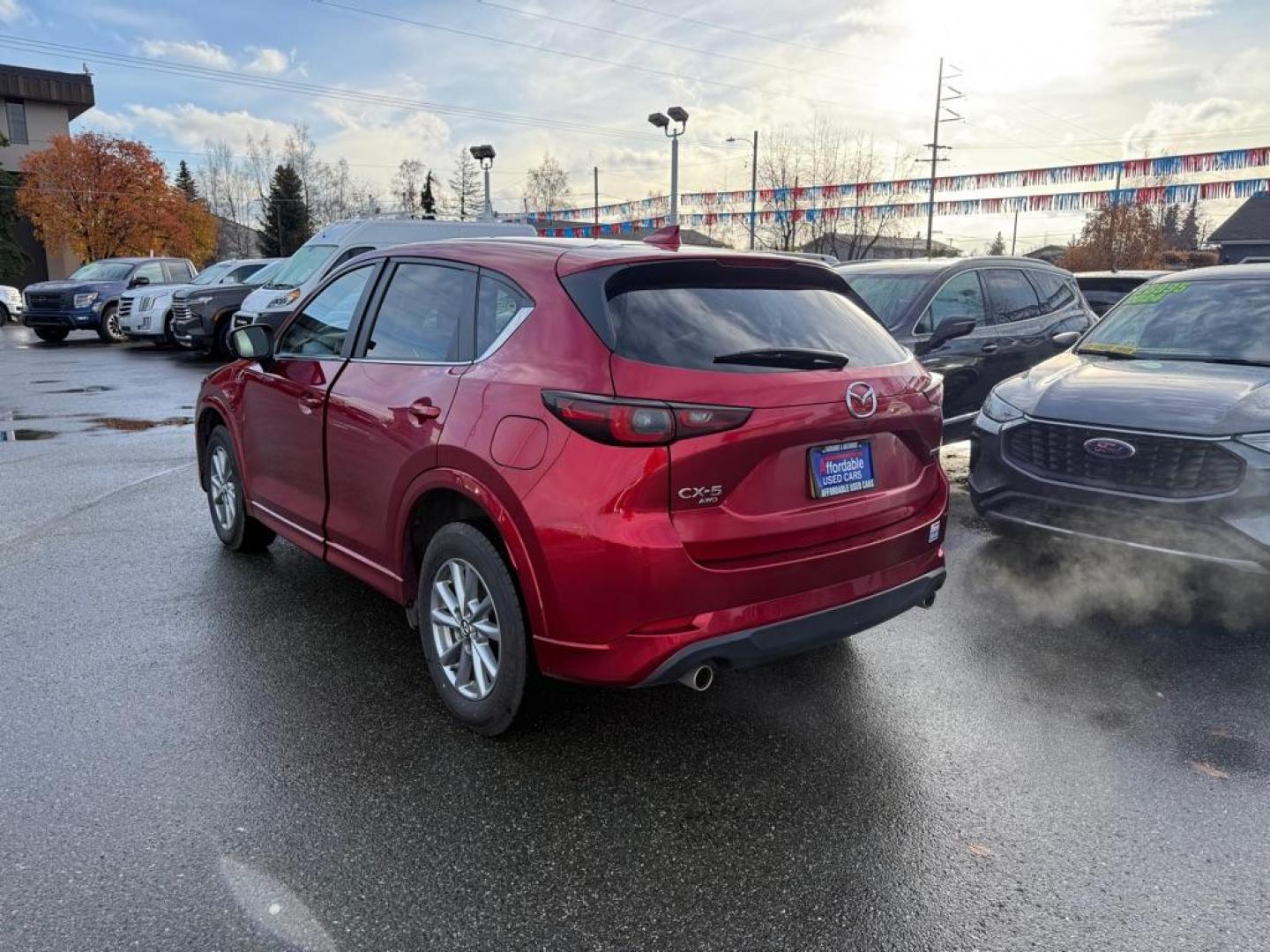 2024 RED MAZDA CX-5 SELECT SELECT (JM3KFBBL1R0) with an 2.5L engine, Automatic transmission, located at 929 East 8th Ave, Anchorage, AK, 99501, (907) 274-2277, 61.214783, -149.866074 - Photo#2