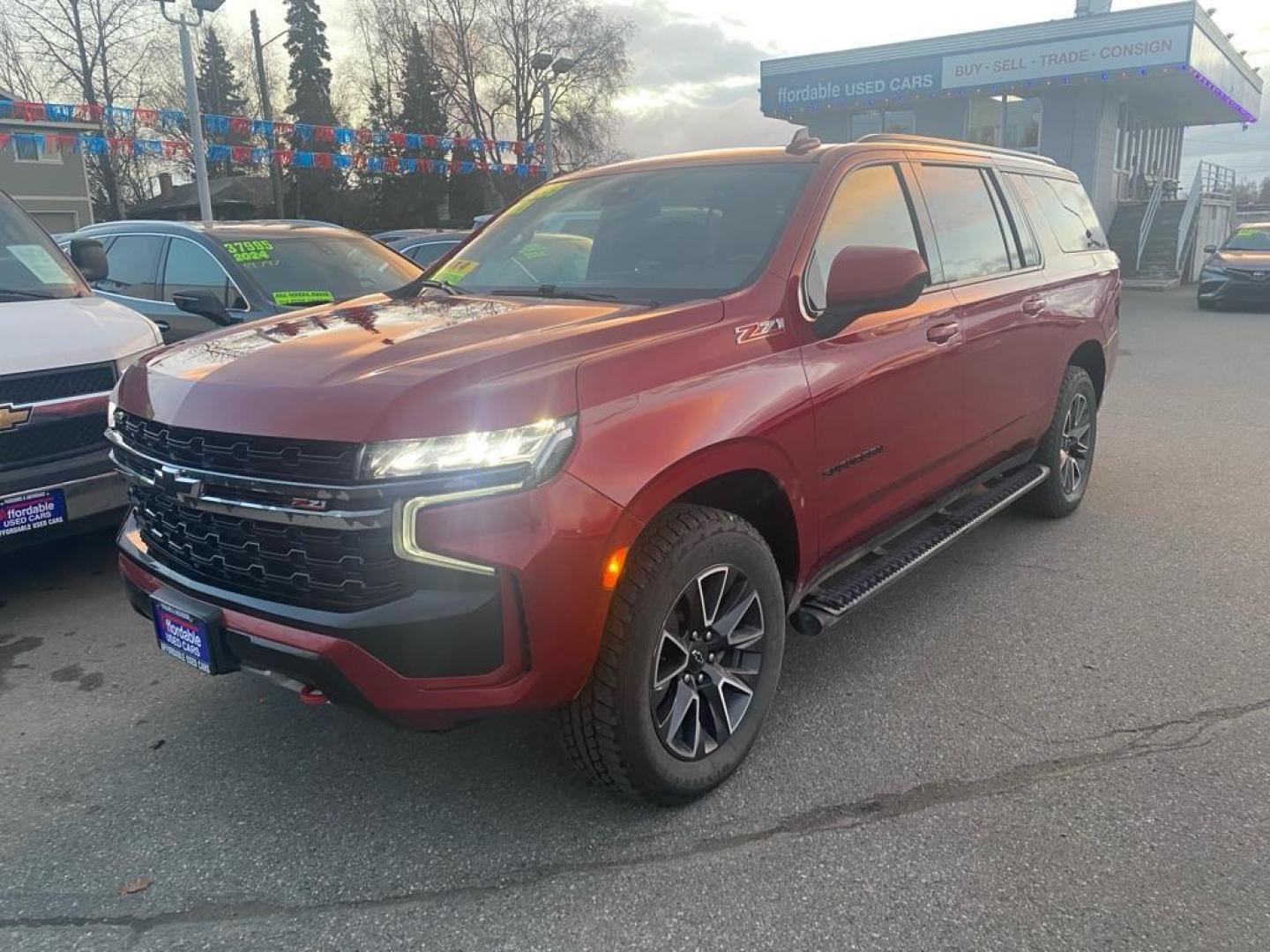 2021 MAROON CHEVROLET SUBURBAN 1500 Z71 (1GNSKDKD7MR) with an 5.3L engine, Automatic transmission, located at 929 East 8th Ave, Anchorage, AK, 99501, (907) 274-2277, 61.214783, -149.866074 - Photo#0