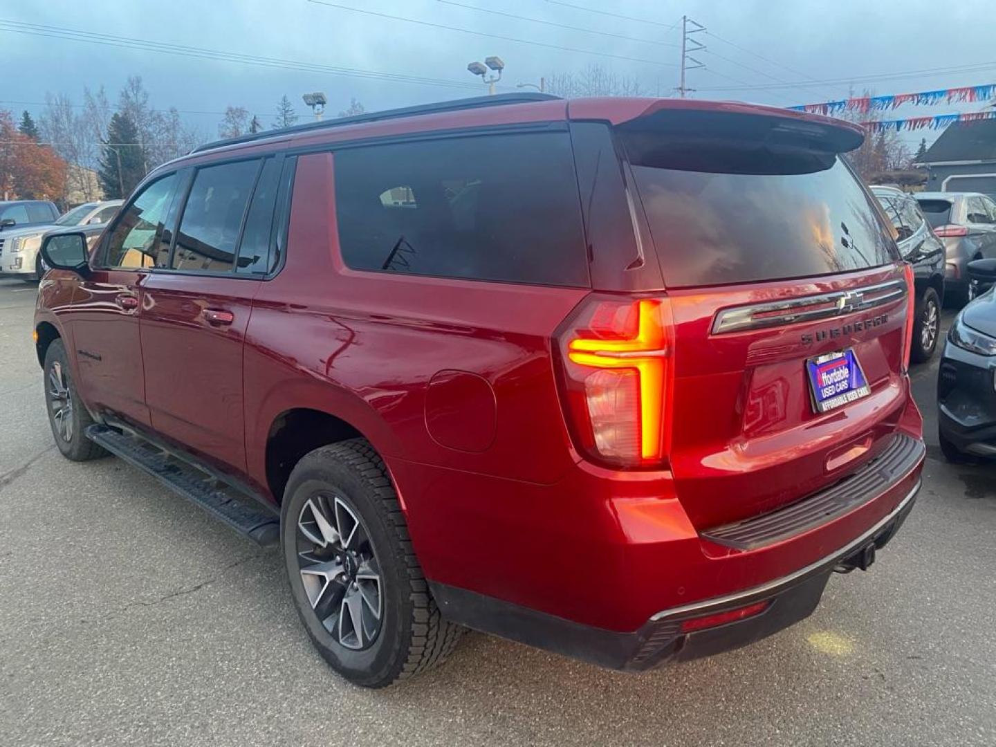 2021 MAROON CHEVROLET SUBURBAN 1500 Z71 (1GNSKDKD7MR) with an 5.3L engine, Automatic transmission, located at 929 East 8th Ave, Anchorage, AK, 99501, (907) 274-2277, 61.214783, -149.866074 - Photo#2