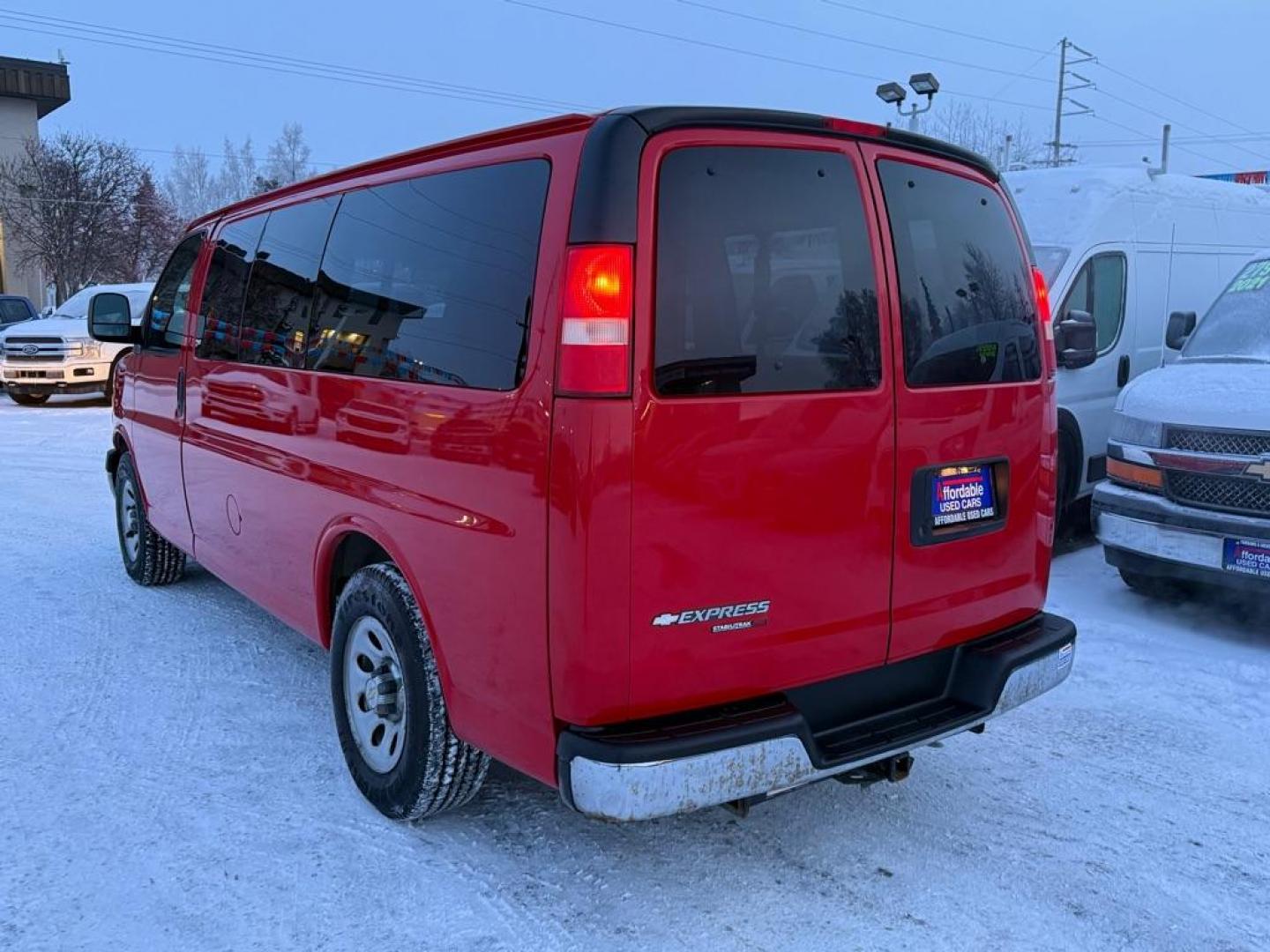 2013 RED CHEVROLET EXPRESS G1500 LT (1GNSHCF42D1) with an 5.3L engine, Automatic transmission, located at 929 East 8th Ave, Anchorage, AK, 99501, (907) 274-2277, 61.214783, -149.866074 - Photo#2
