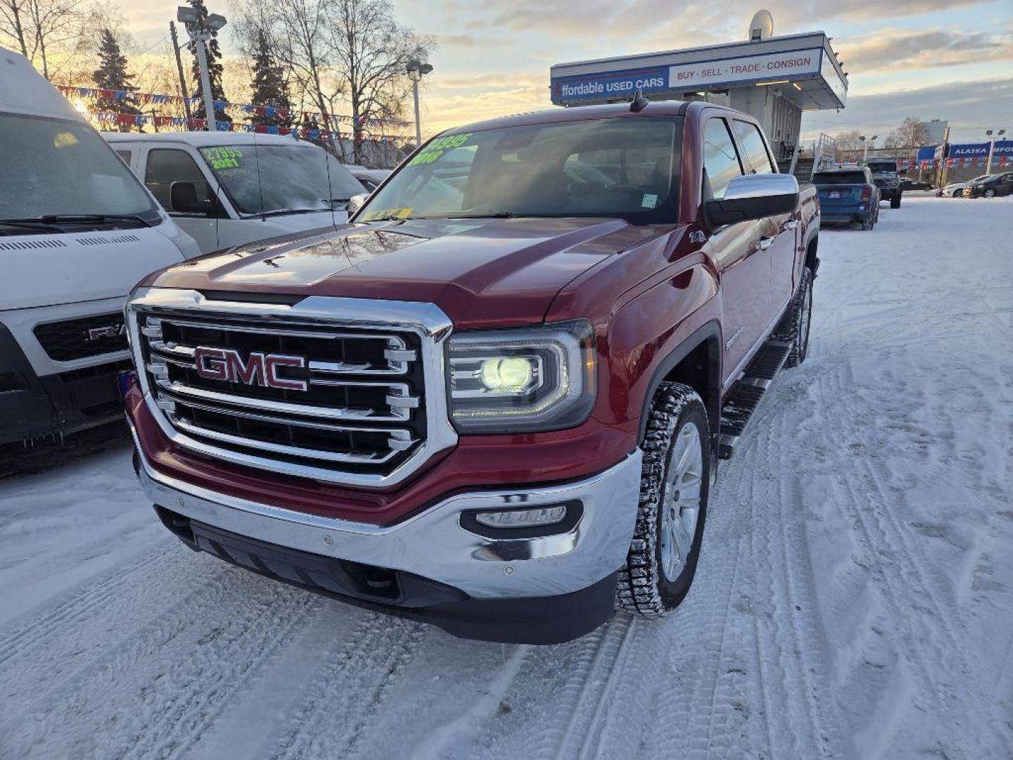 2018 MAROON GMC SIERRA 1500 SLT (3GTU2NECXJG) with an 5.3L engine, Automatic transmission, located at 929 East 8th Ave, Anchorage, AK, 99501, (907) 274-2277, 61.214783, -149.866074 - Photo#0