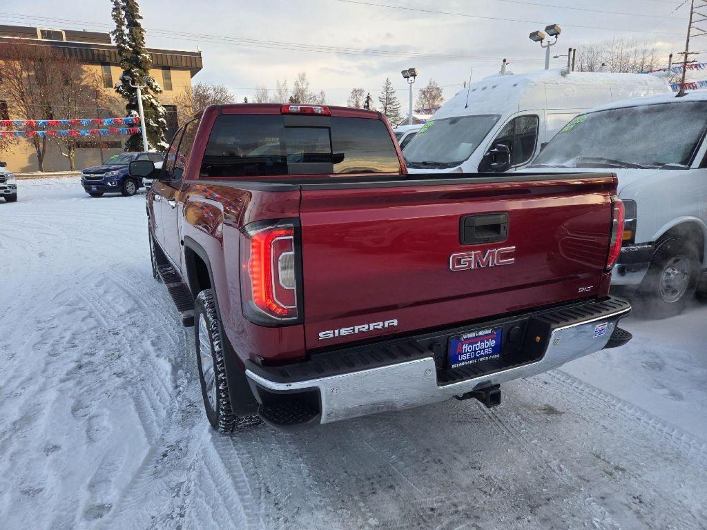 2018 MAROON GMC SIERRA 1500 SLT (3GTU2NECXJG) with an 5.3L engine, Automatic transmission, located at 929 East 8th Ave, Anchorage, AK, 99501, (907) 274-2277, 61.214783, -149.866074 - Photo#2