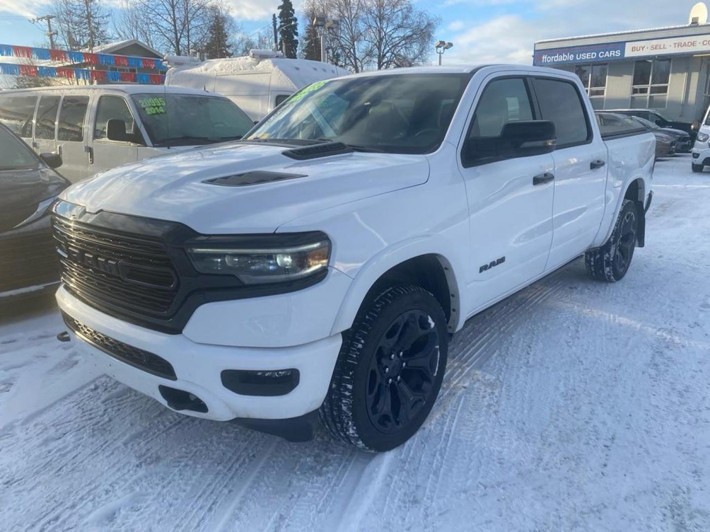 2023 WHITE RAM 1500 LIMITED (1C6SRFHT8PN) with an 5.7L engine, Automatic transmission, located at 929 East 8th Ave, Anchorage, AK, 99501, (907) 274-2277, 61.214783, -149.866074 - Photo#0