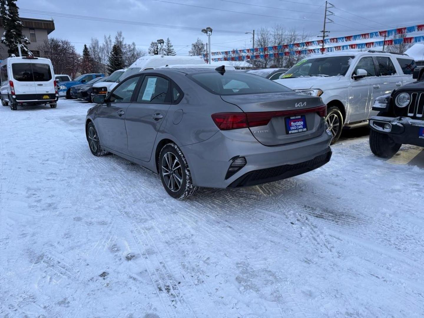 2023 GRAY KIA FORTE LX (3KPF24AD7PE) with an 2L engine, Continuously Variable transmission, located at 929 East 8th Ave, Anchorage, AK, 99501, (907) 274-2277, 61.214783, -149.866074 - Photo#2