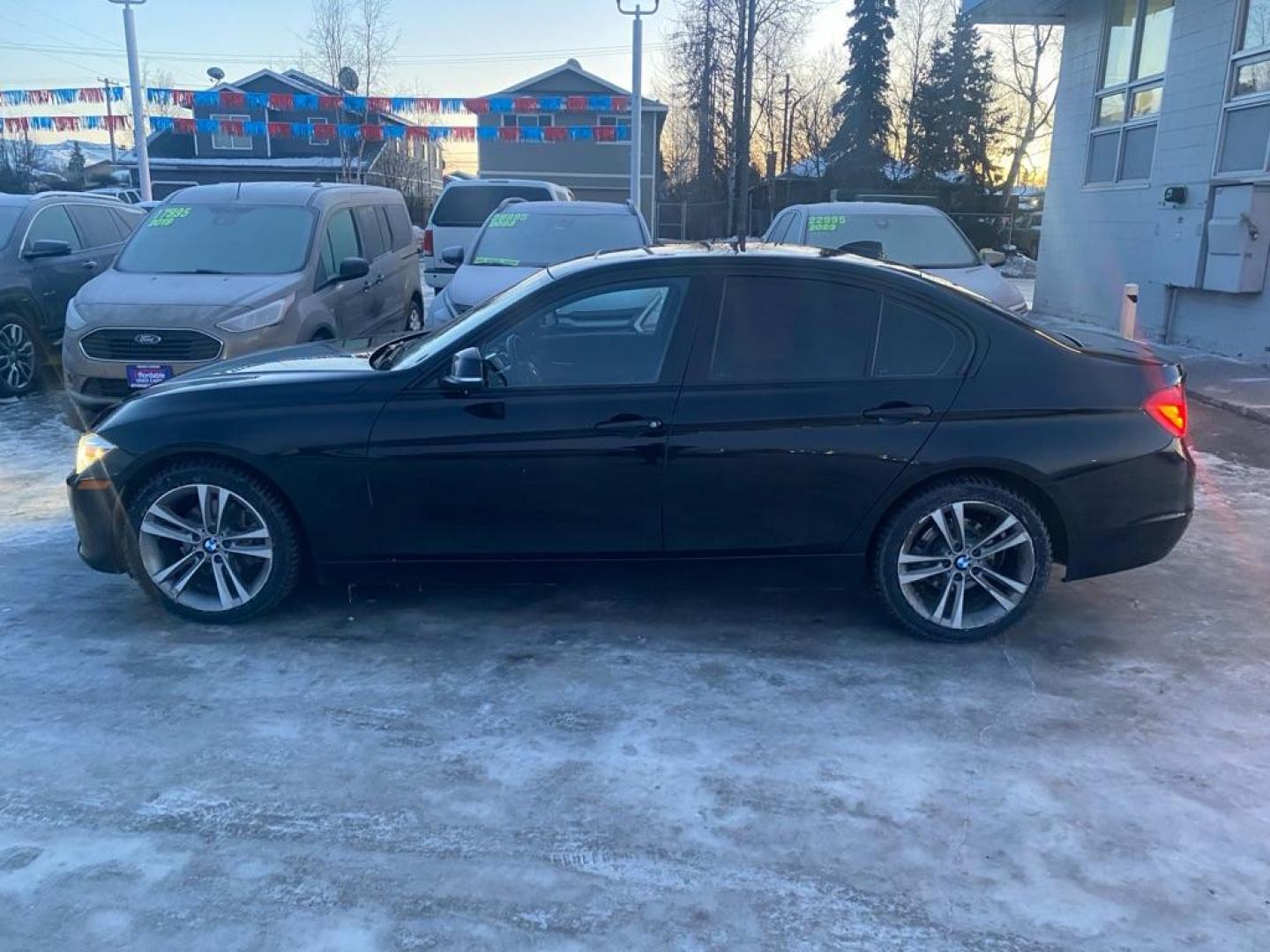 2015 BLACK BMW 328 XI (WBA3B3G50FN) with an 2.0L engine, Automatic transmission, located at 929 East 8th Ave, Anchorage, AK, 99501, (907) 274-2277, 61.214783, -149.866074 - Photo#1