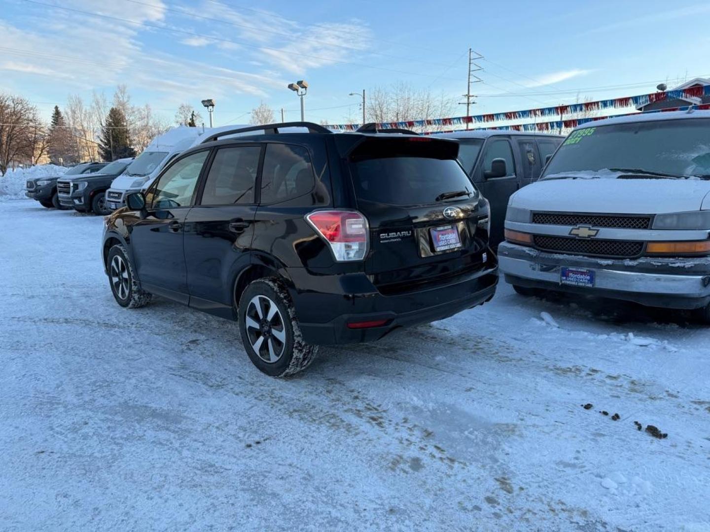 2018 BLACK SUBARU FORESTER 2.5I PREMIUM (JF2SJAGC8JH) with an 2.5L engine, 6-Speed Manual transmission, located at 929 East 8th Ave, Anchorage, AK, 99501, (907) 274-2277, 61.214783, -149.866074 - Photo#2