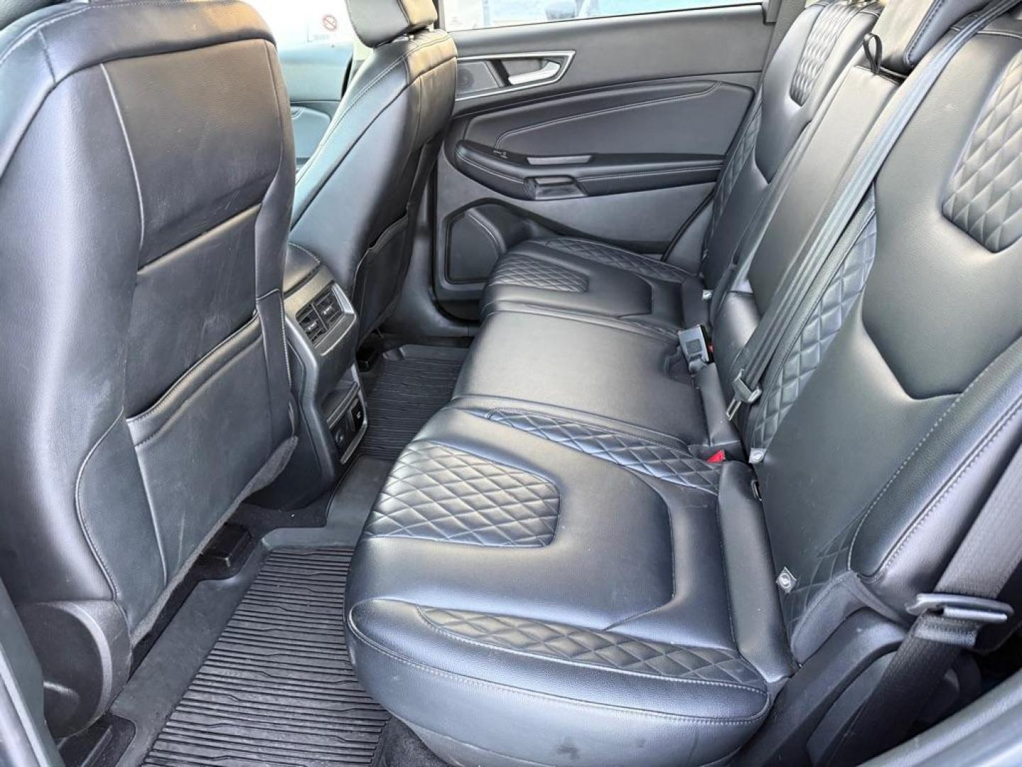 2023 BLUE FORD EDGE TITANIUM TITANIUM (2FMPK4K99PB) with an 2.0L engine, Automatic transmission, located at 929 East 8th Ave, Anchorage, AK, 99501, (907) 274-2277, 61.214783, -149.866074 - Photo#3