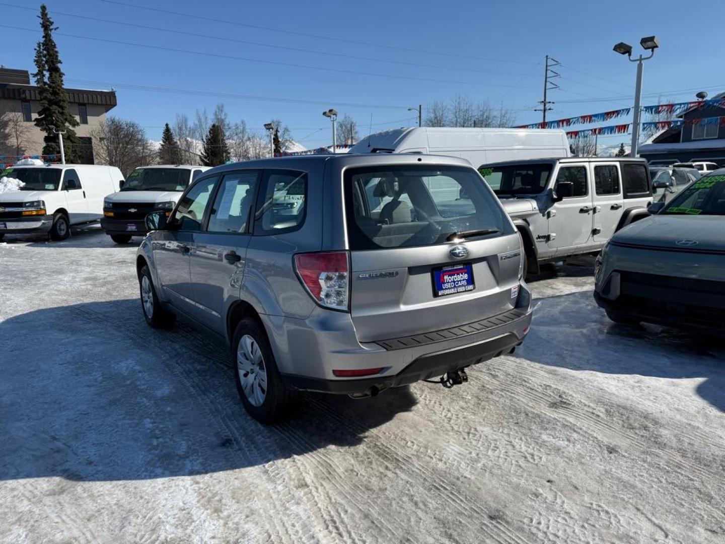 2009 SILVER SUBARU FORESTER 2.5X (JF2SH61689G) with an 2.5L engine, Automatic transmission, located at 929 East 8th Ave, Anchorage, AK, 99501, (907) 274-2277, 61.214783, -149.866074 - Photo#2