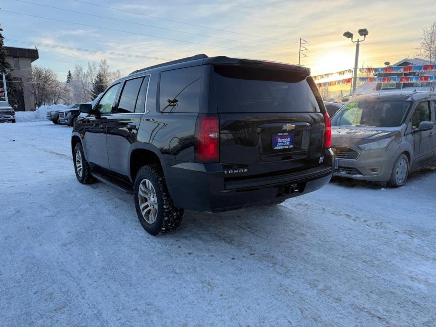 2017 BLACK CHEVROLET TAHOE 1500 LT (1GNSKBKC3HR) with an 5.3L engine, Automatic transmission, located at 929 East 8th Ave, Anchorage, AK, 99501, (907) 274-2277, 61.214783, -149.866074 - Photo#2