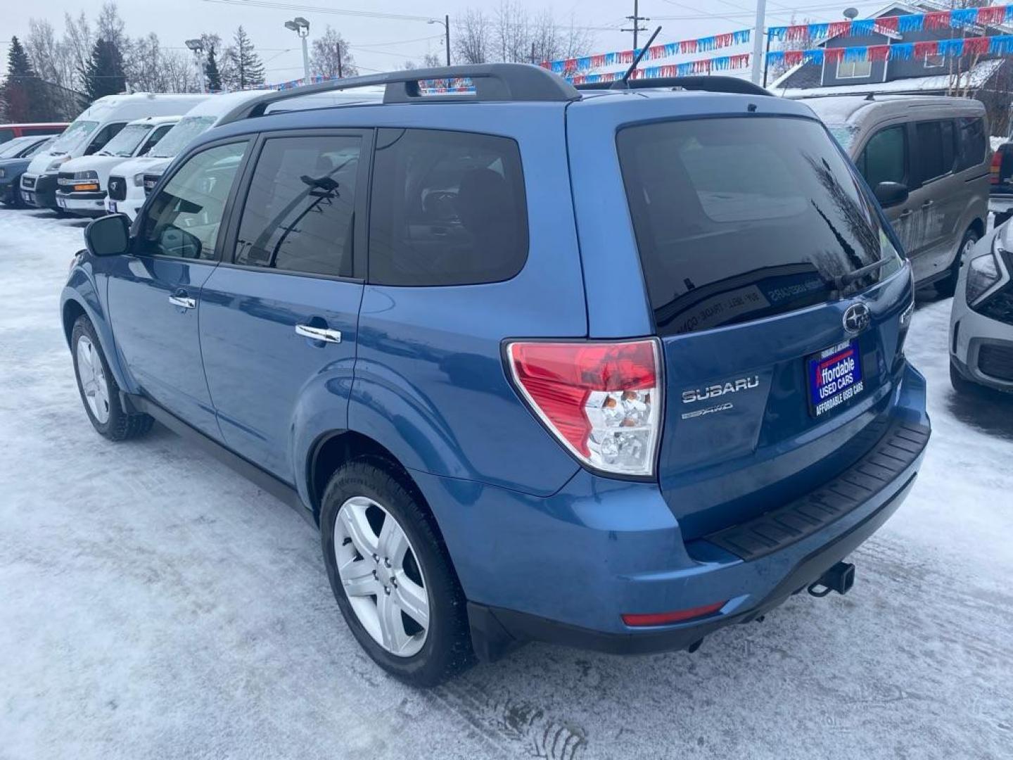2010 BLUE SUBARU FORESTER 2.5X PREMIUM (JF2SH6CC0AH) with an 2.5L engine, Automatic transmission, located at 929 East 8th Ave, Anchorage, AK, 99501, (907) 274-2277, 61.214783, -149.866074 - Photo#2