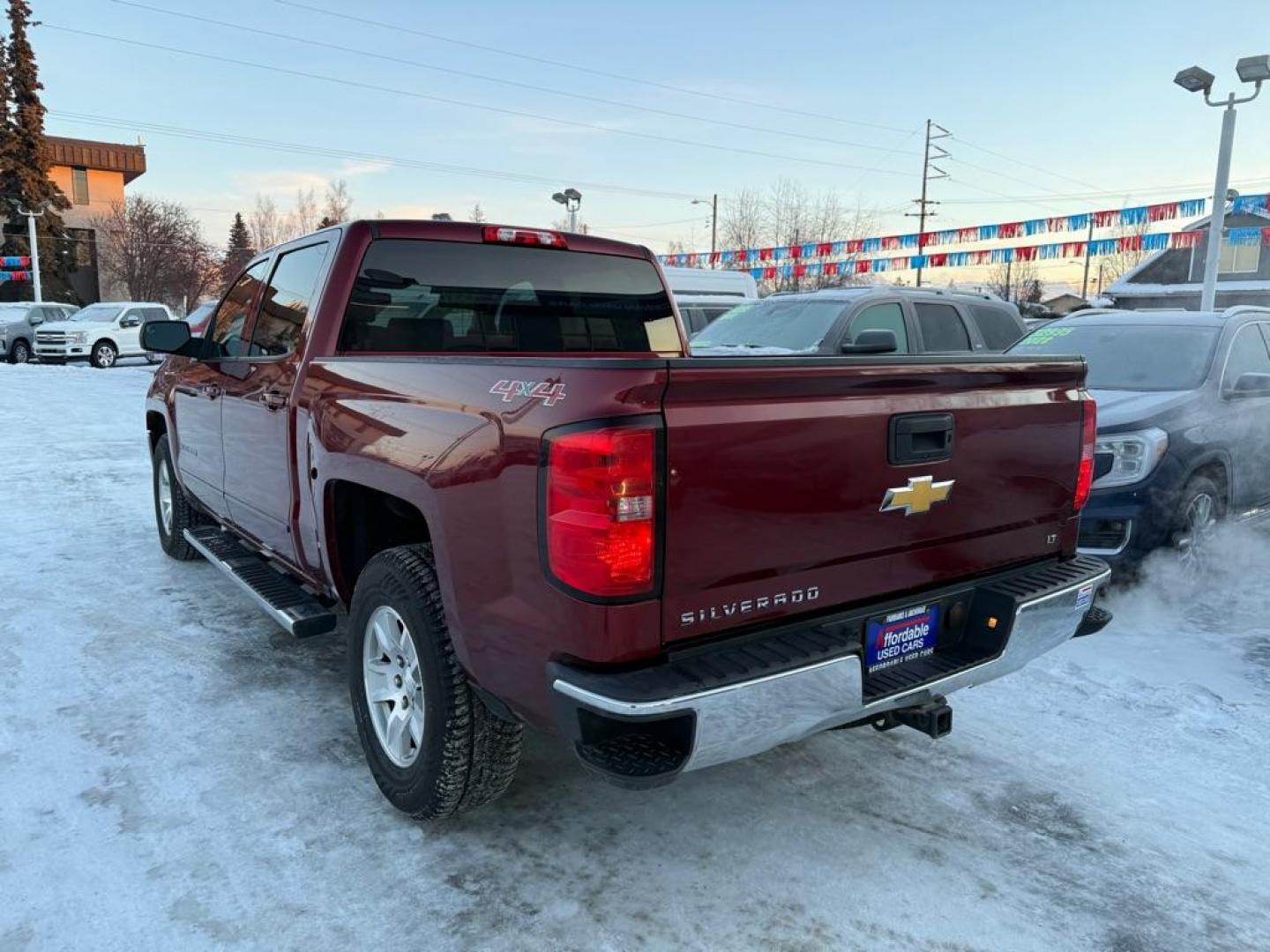 2017 MAROON CHEVROLET SILVERADO 1500 LT (3GCUKREC1HG) with an 5.3L engine, Automatic transmission, located at 929 East 8th Ave, Anchorage, AK, 99501, (907) 274-2277, 61.214783, -149.866074 - Photo#2