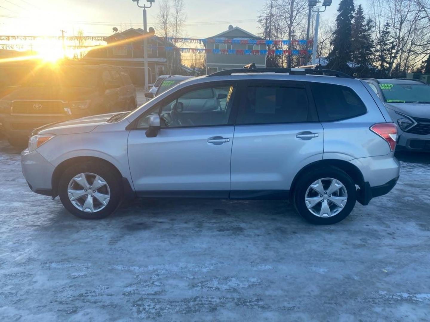 2015 SILVER SUBARU FORESTER 2.5I PREMIUM (JF2SJAFC3FH) with an 2.5L engine, 6-Speed Manual transmission, located at 929 East 8th Ave, Anchorage, AK, 99501, (907) 274-2277, 61.214783, -149.866074 - Photo#1