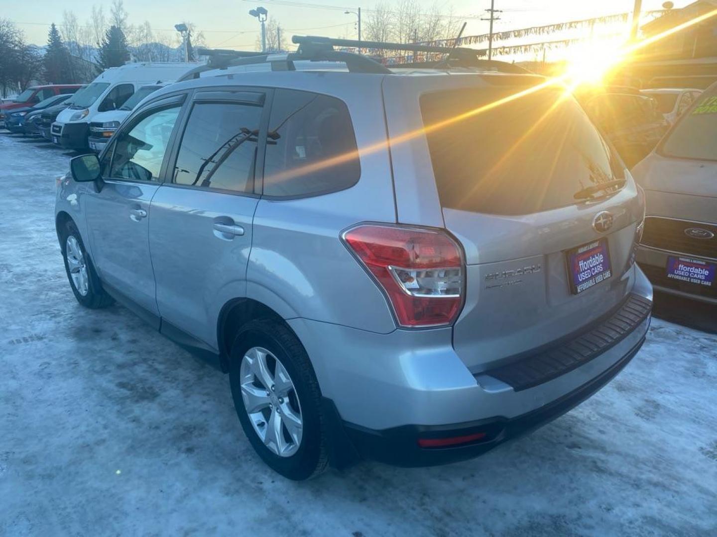 2015 SILVER SUBARU FORESTER 2.5I PREMIUM (JF2SJAFC3FH) with an 2.5L engine, 6-Speed Manual transmission, located at 929 East 8th Ave, Anchorage, AK, 99501, (907) 274-2277, 61.214783, -149.866074 - Photo#2