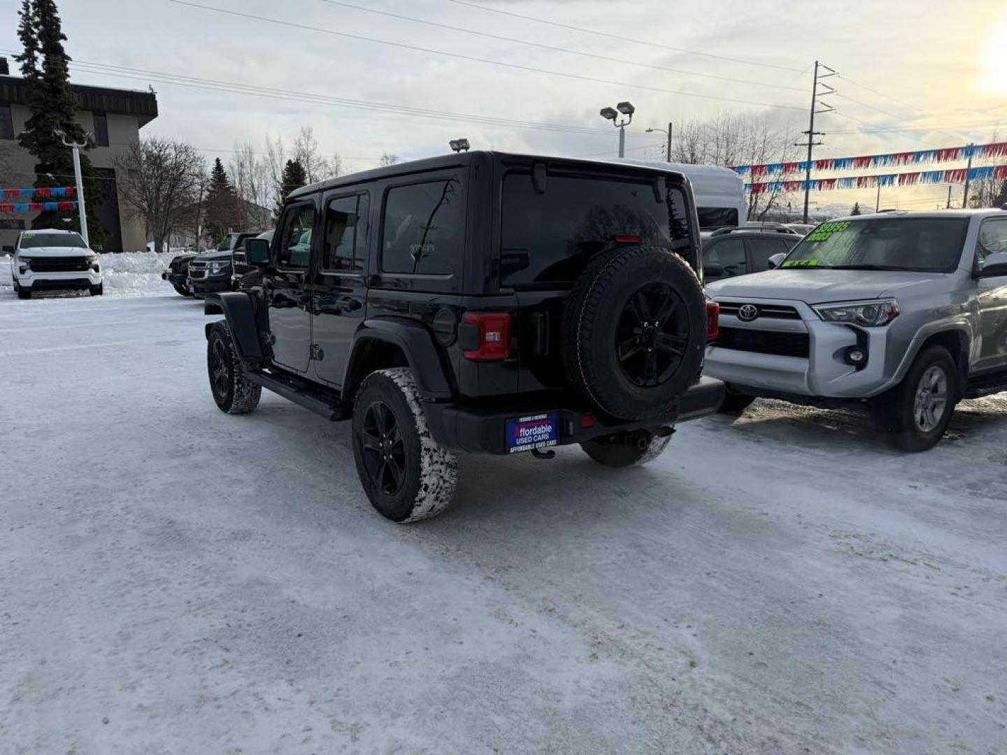 2021 BLACK JEEP WRANGLER UNLIMI SAHARA (1C4HJXEN4MW) with an 2.0L engine, Automatic transmission, located at 929 East 8th Ave, Anchorage, AK, 99501, (907) 274-2277, 61.214783, -149.866074 - Photo#2