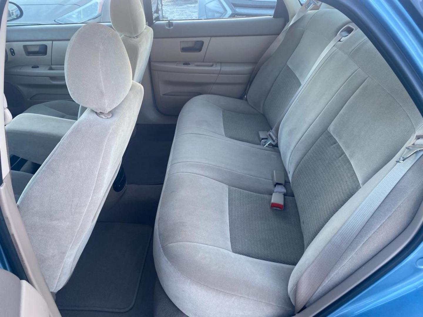 2007 BLUE FORD TAURUS SE (1FAFP53U07A) with an 3.0L engine, Automatic transmission, located at 929 East 8th Ave, Anchorage, AK, 99501, (907) 274-2277, 61.214783, -149.866074 - Photo#3