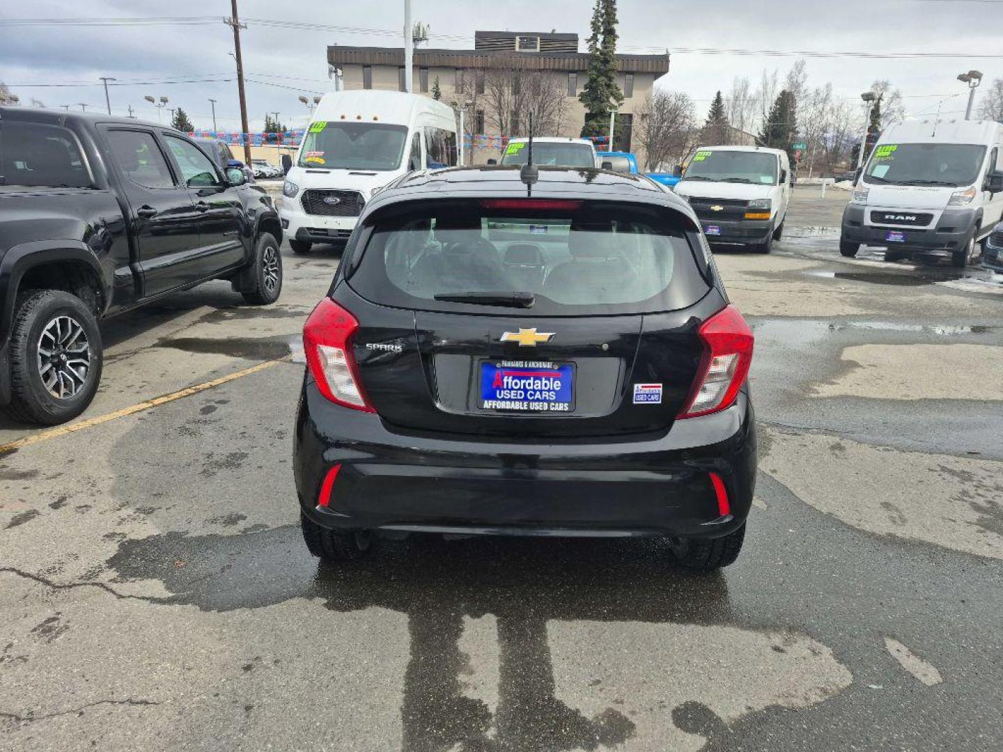 2021 BLACK CHEVROLET SPARK LS (KL8CB6SAXMC) with an 1.4L engine, Continuously Variable transmission, located at 929 East 8th Ave, Anchorage, AK, 99501, (907) 274-2277, 61.214783, -149.866074 - Photo#0