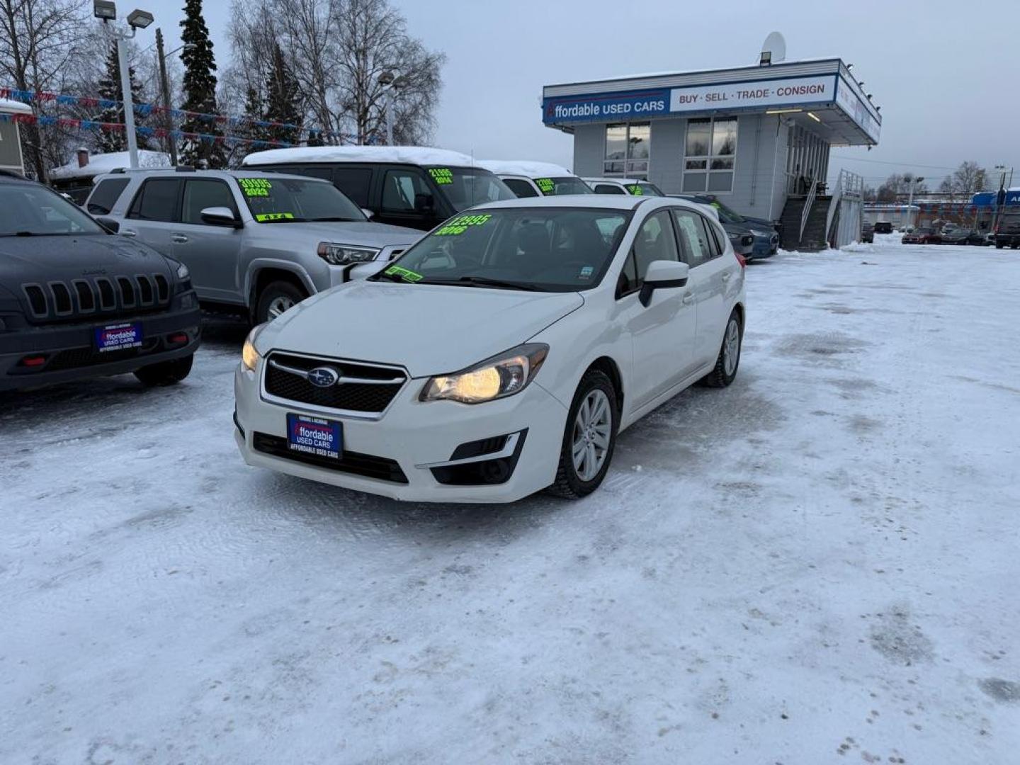 2016 WHITE SUBARU IMPREZA PREMIUM (JF1GPAB61G8) with an 2.0L engine, Continuously Variable transmission, located at 929 East 8th Ave, Anchorage, AK, 99501, (907) 274-2277, 61.214783, -149.866074 - Photo#0
