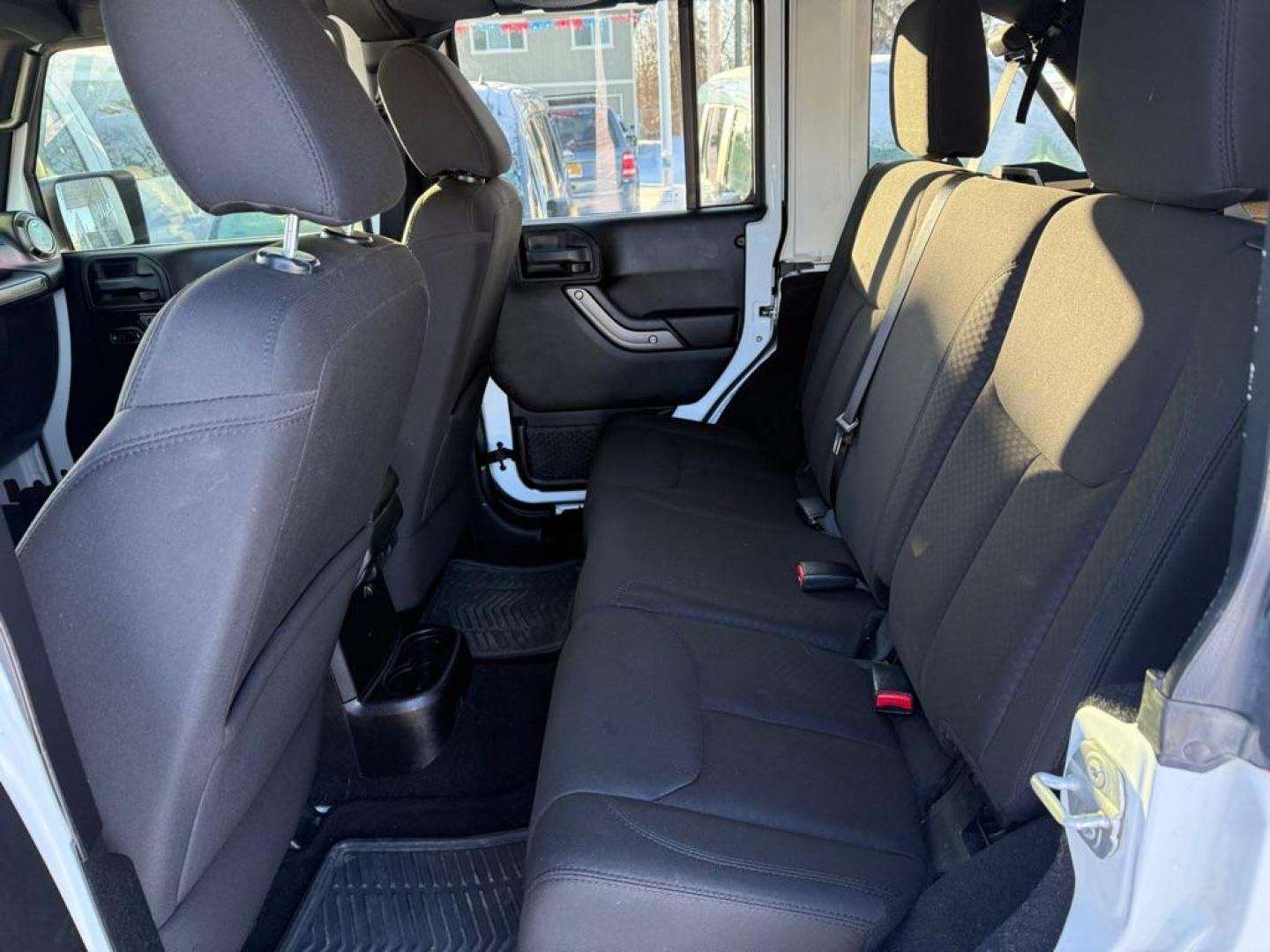 2014 WHITE JEEP WRANGLER UNLIMI SPORT (1C4BJWDG1EL) with an 3.6L engine, Automatic transmission, located at 929 East 8th Ave, Anchorage, AK, 99501, (907) 274-2277, 61.214783, -149.866074 - Photo#3