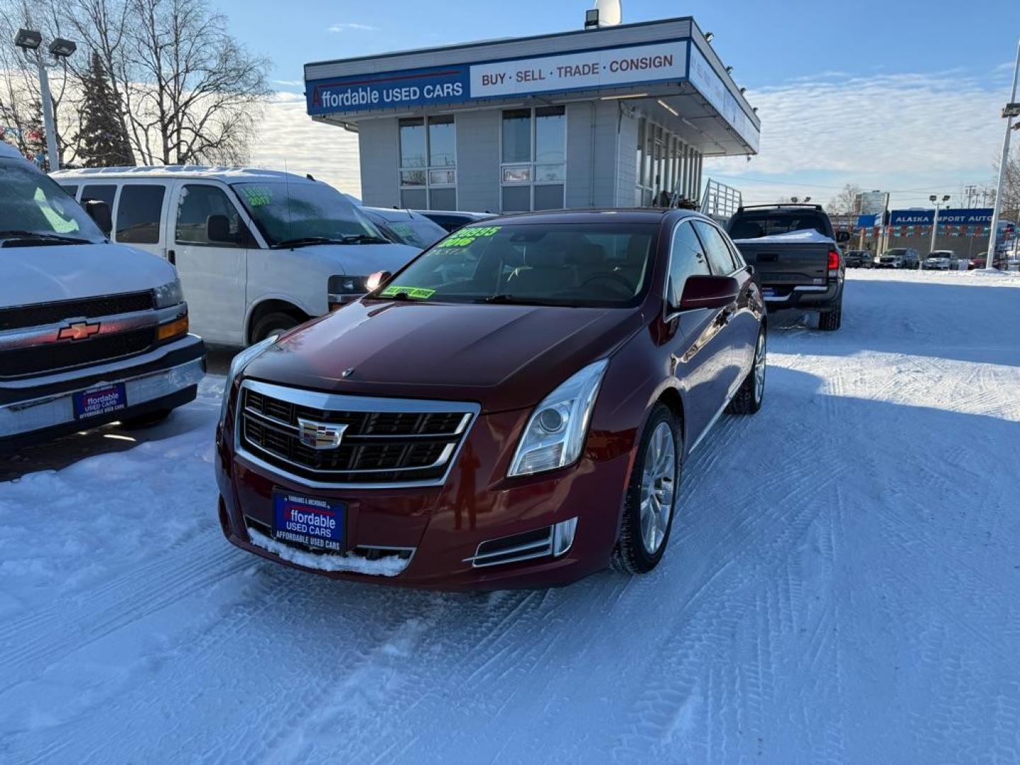 2016 MAROON CADILLAC XTS PREMIUM COLLECTION (2G61R5S37G9) with an 3.6L engine, Automatic transmission, located at 929 East 8th Ave, Anchorage, AK, 99501, (907) 274-2277, 61.214783, -149.866074 - Photo#0